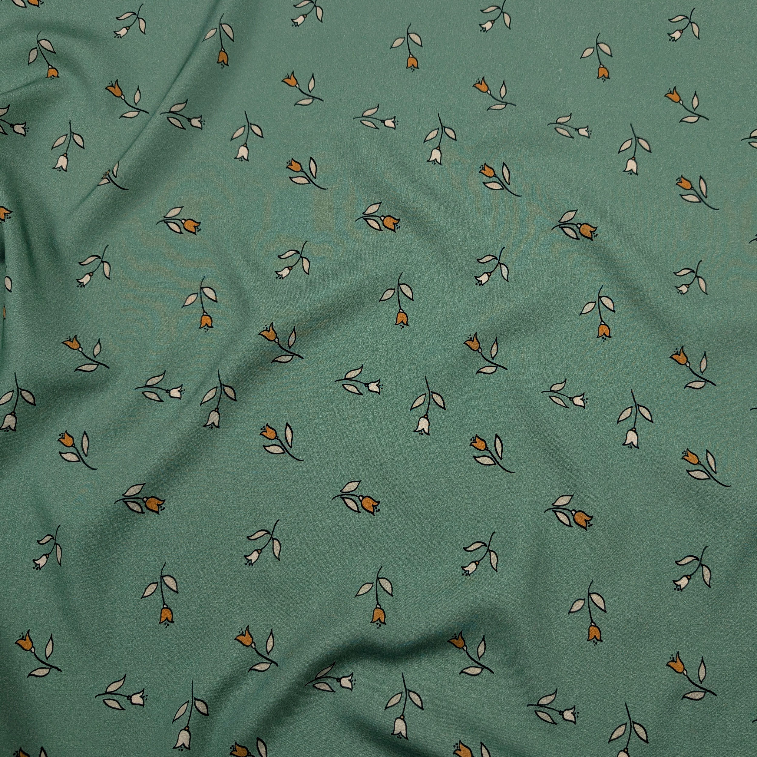 Viscose with Floral Pattern on a Green Background Image