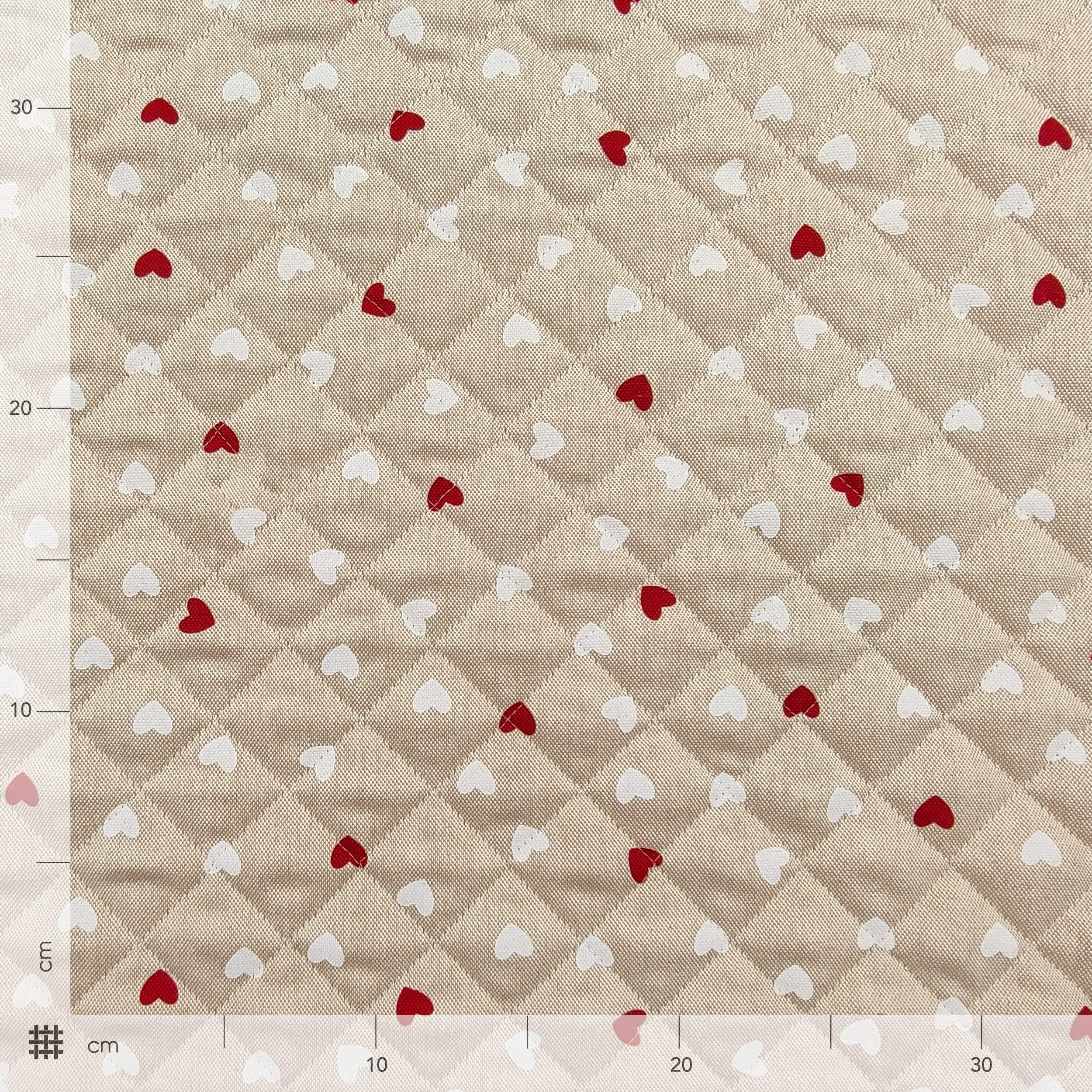 Red and White Heart Quilted Fabric Image