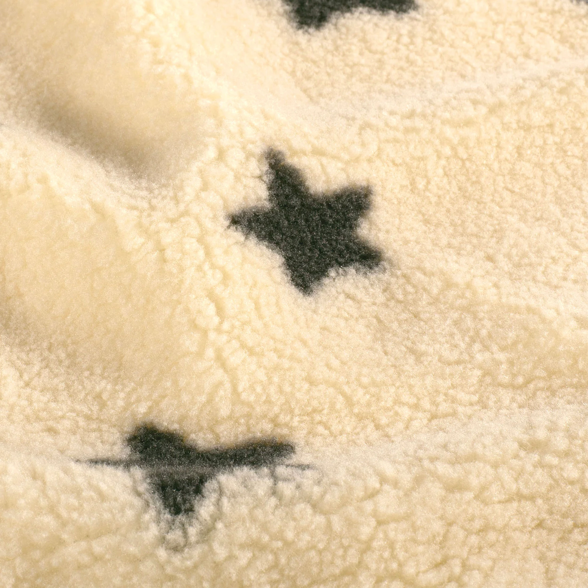 Tissu Sherpa Beige Black Stars