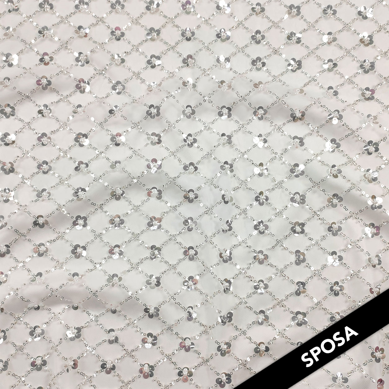 Tulle de mariée brodé de perles et de paillettes blanc