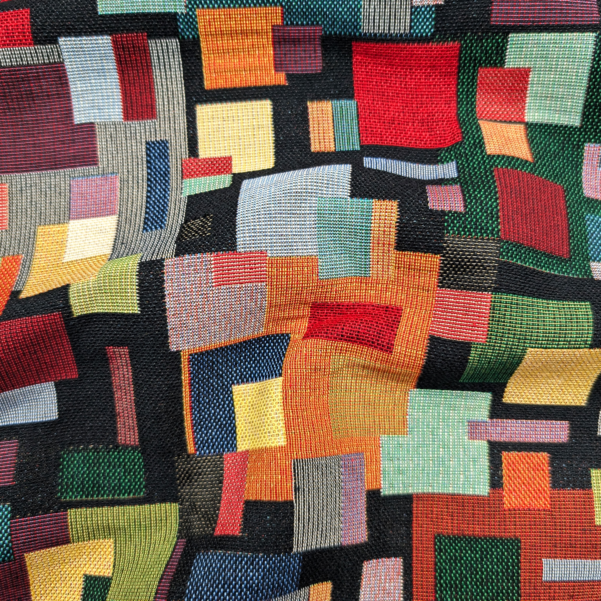 Gobelin fabric with coloured geometric patterns Image