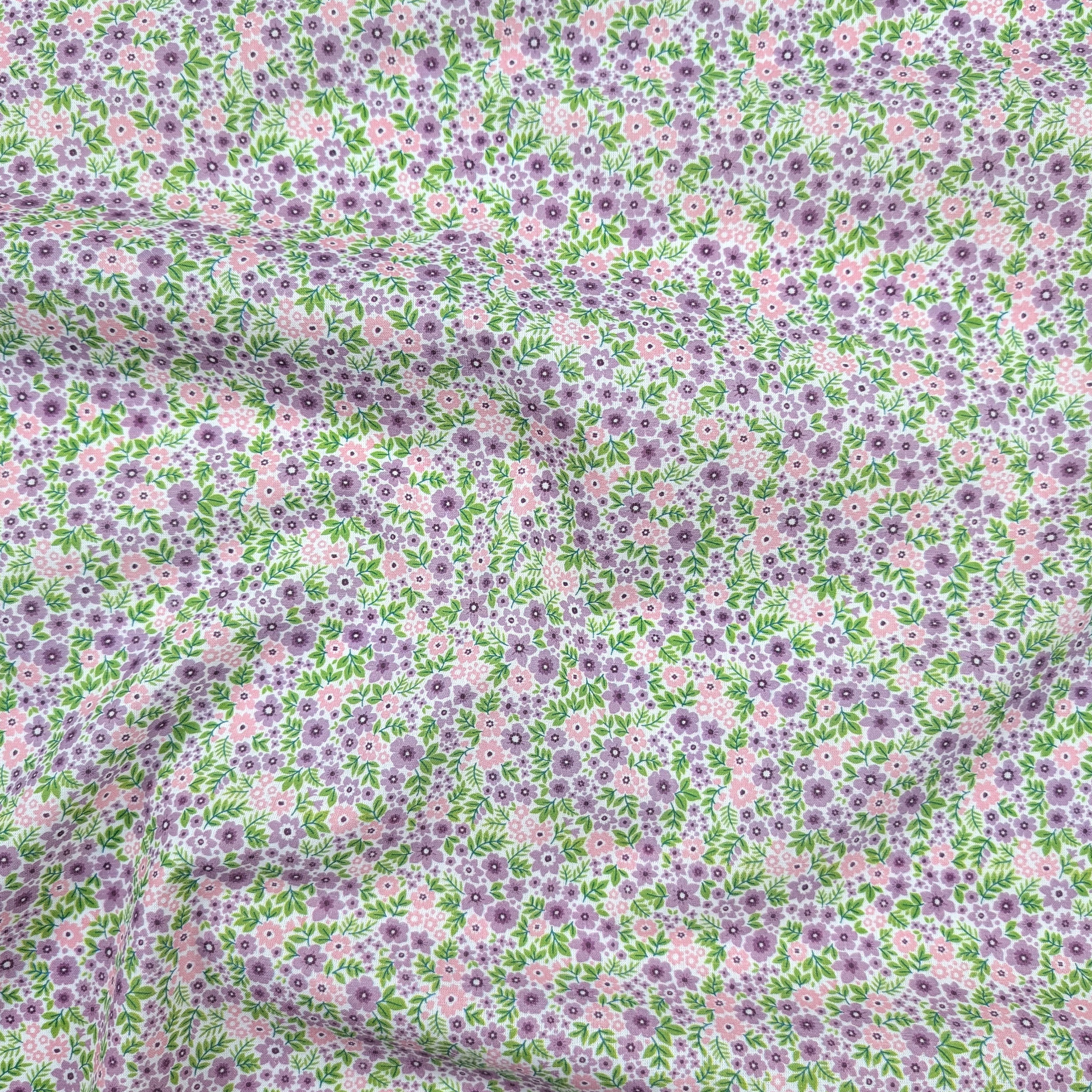 Percale cotton with pink and lilac flowers Image