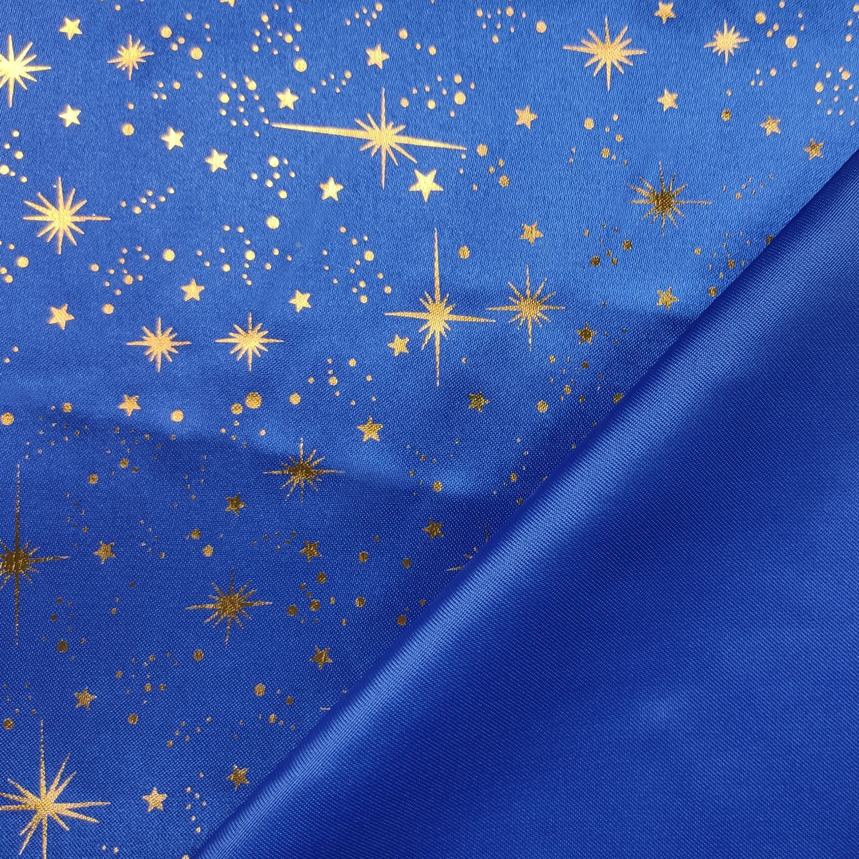 tessuto-raso-stampato-stelle-oro