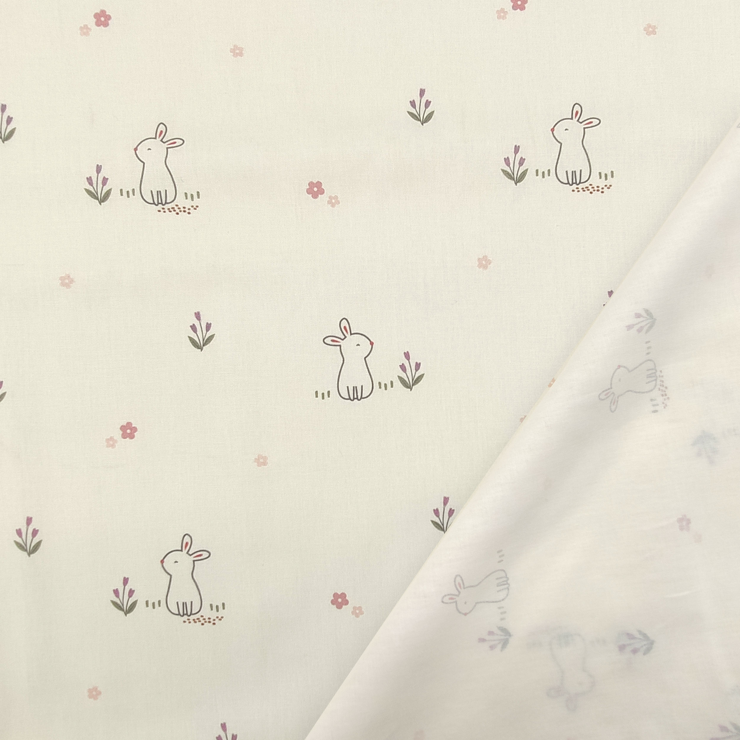 Popeline de coton avec fantaisie de lapin