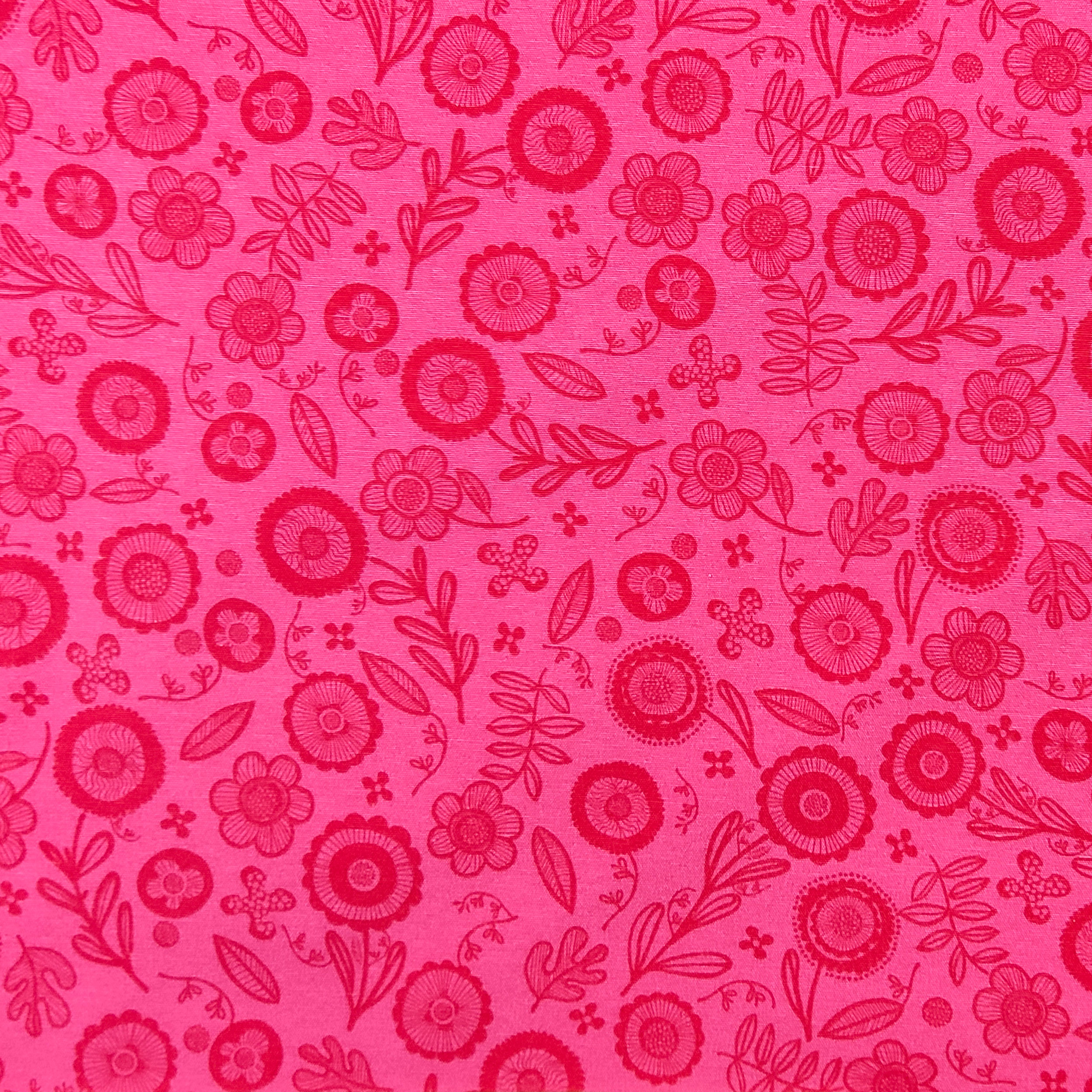 Tejido de algodón con estampado de flores Fuxia