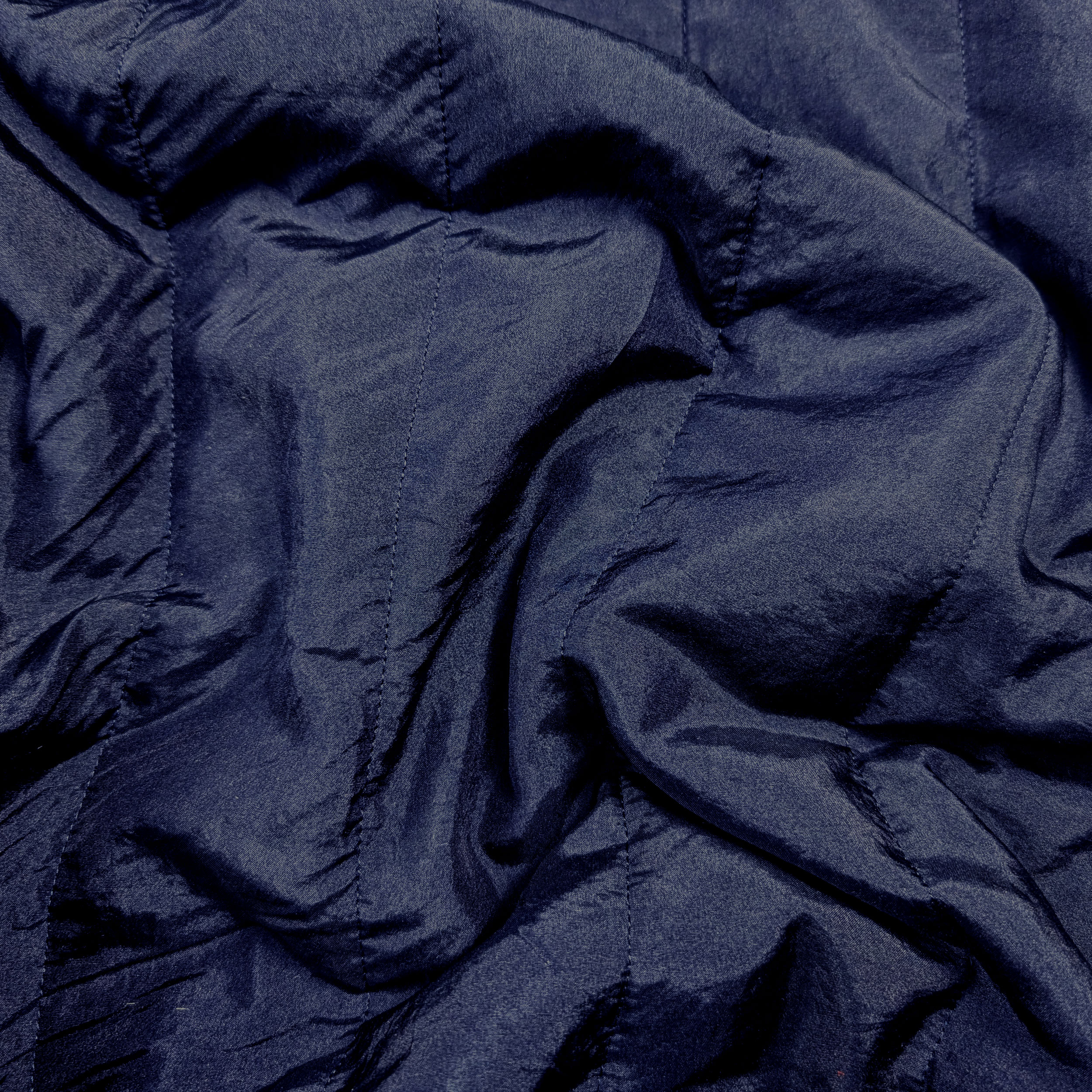 Dark Blue Quilted with Black TNT Backing Image