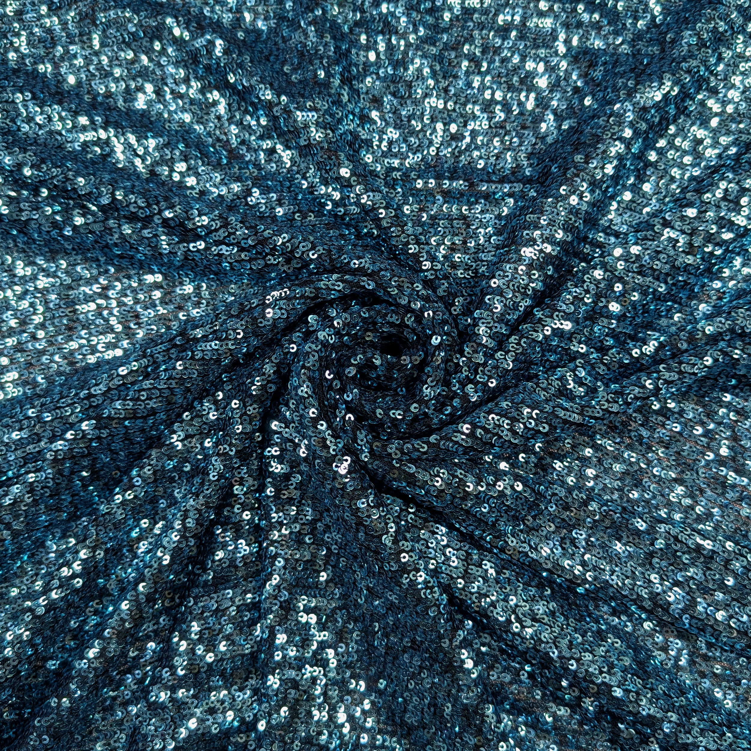 Sequins on Turquoise Stretch Tulle Image