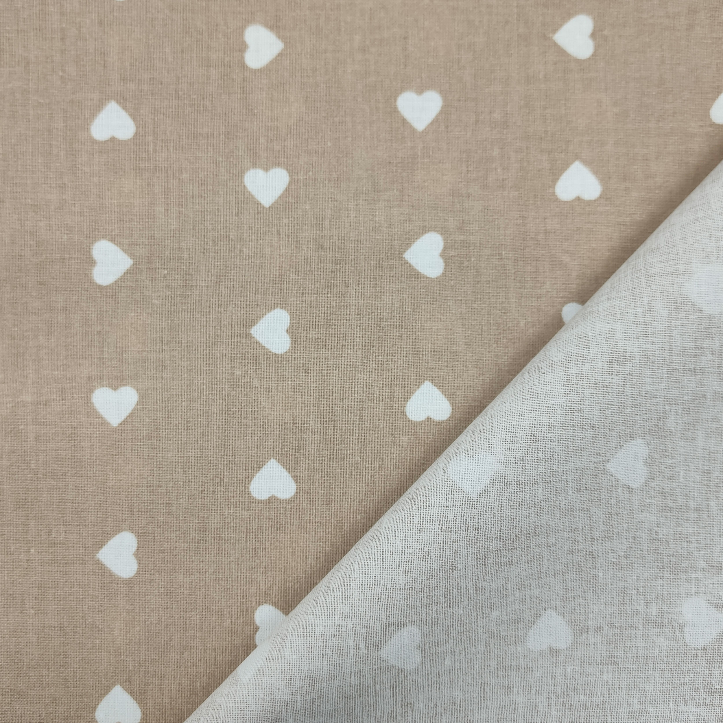 Printed Cotton with White Hearts - Colored Background  Image