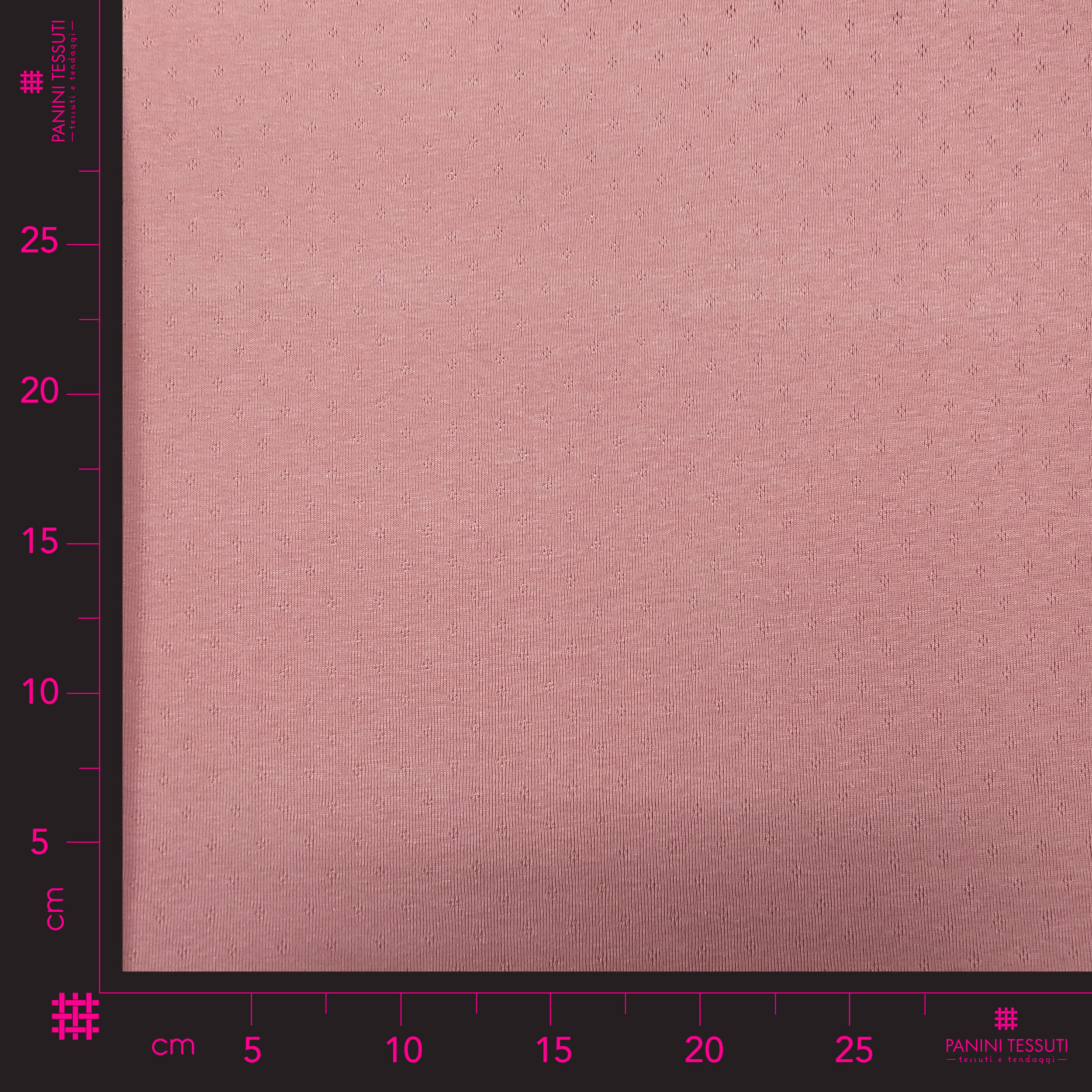 Jersey Cotton Jersey Perforated Flowers on a Pink Background Image