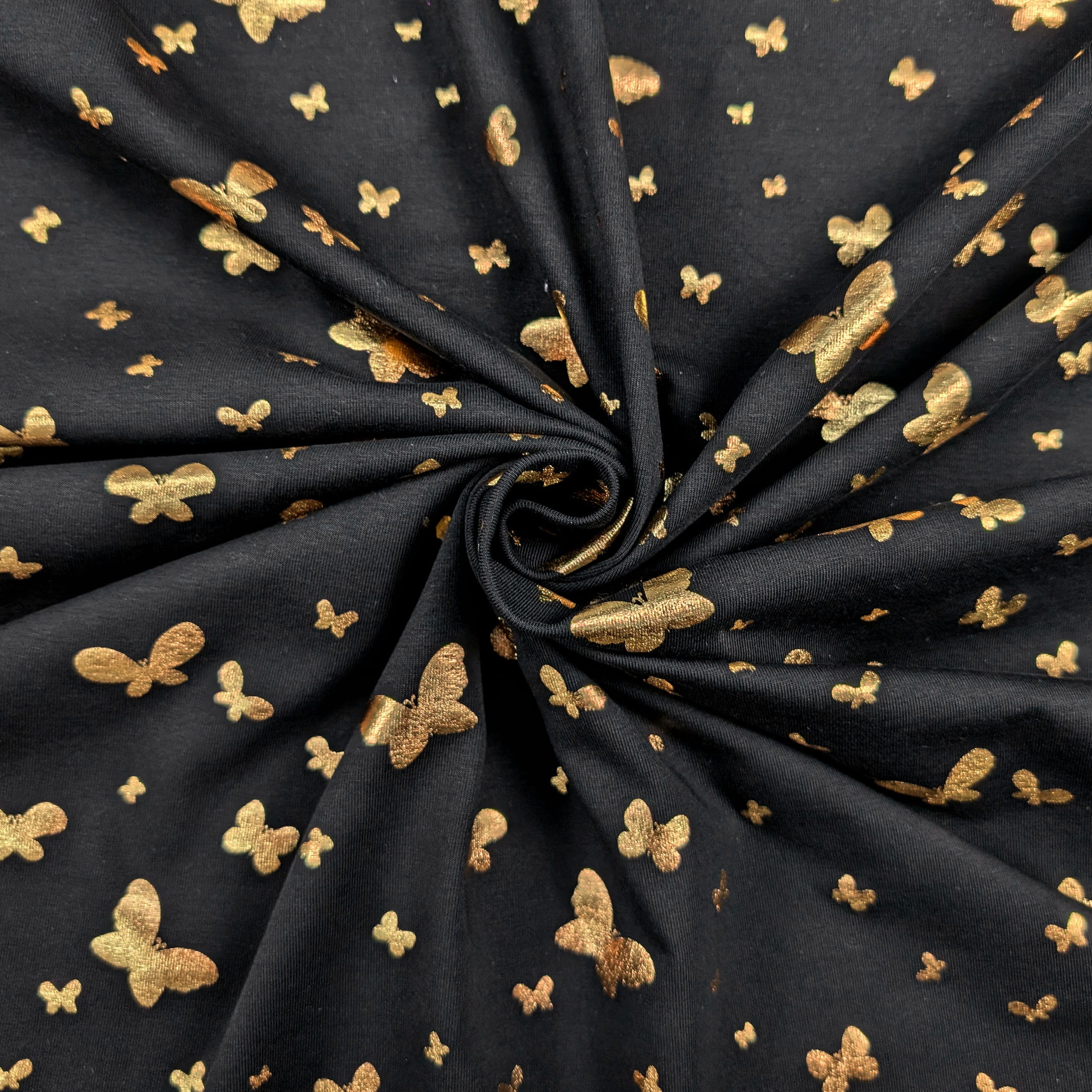 Black cotton jersey with gold butterflies Image