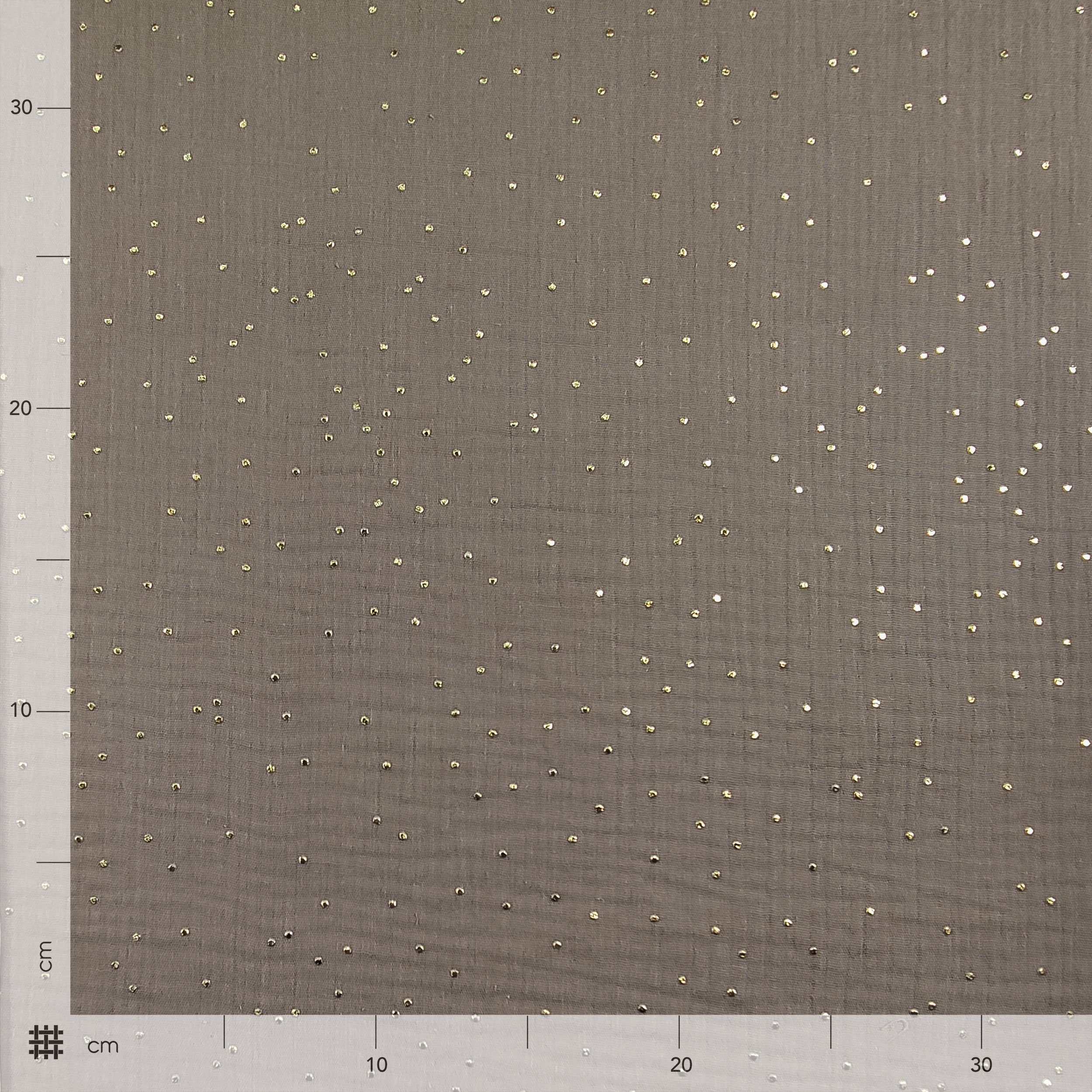 Beigefarbener Baumwollmusselin mit goldenen Polka Dots