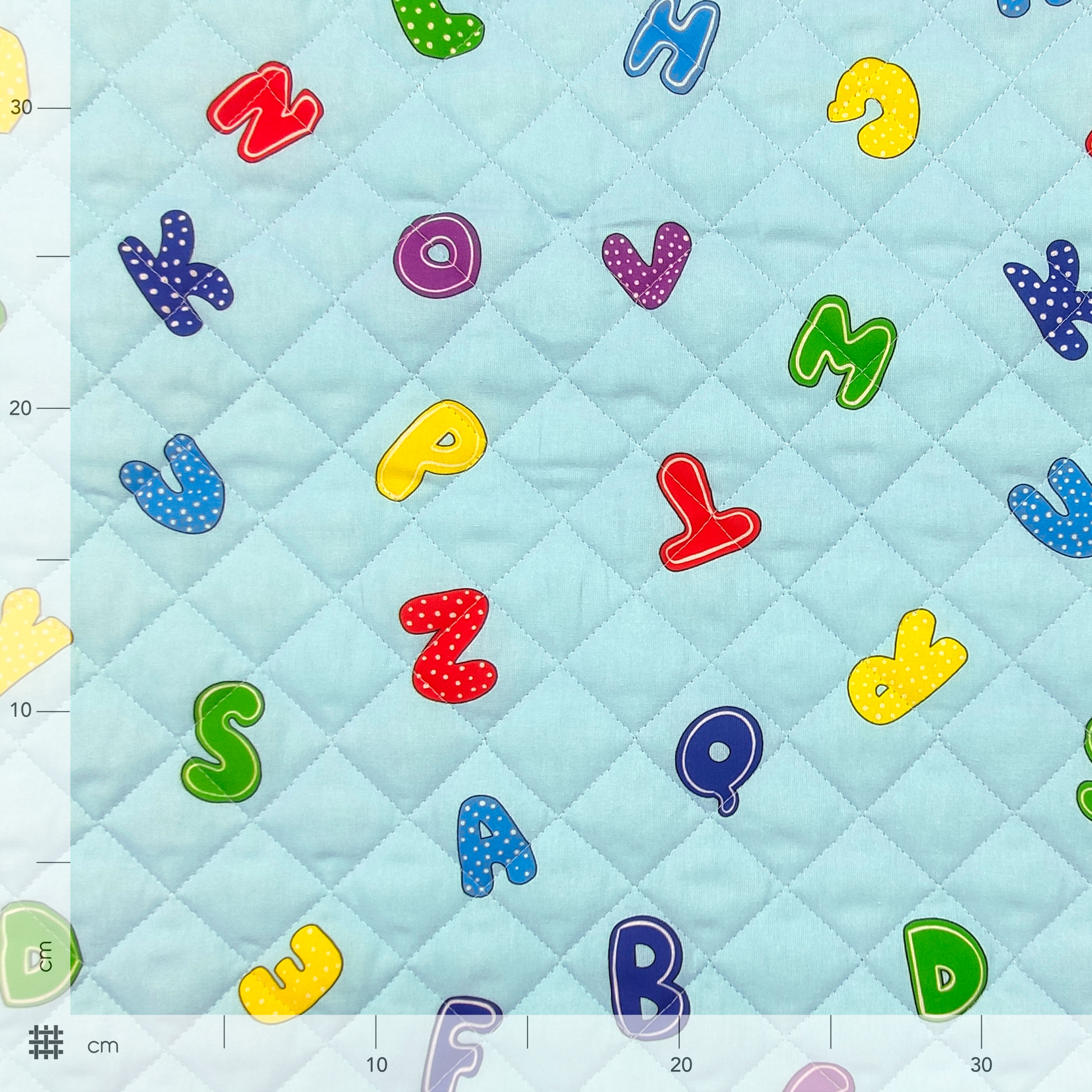Alphabet Quilted Fabric Light Blue Background Image