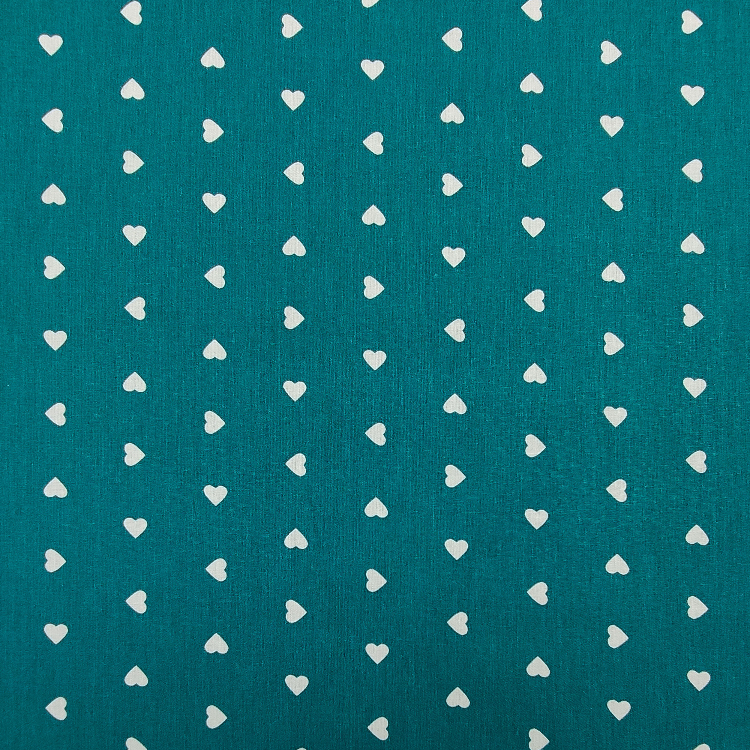 Tissu de coton Cœurs blancs Fond coloré