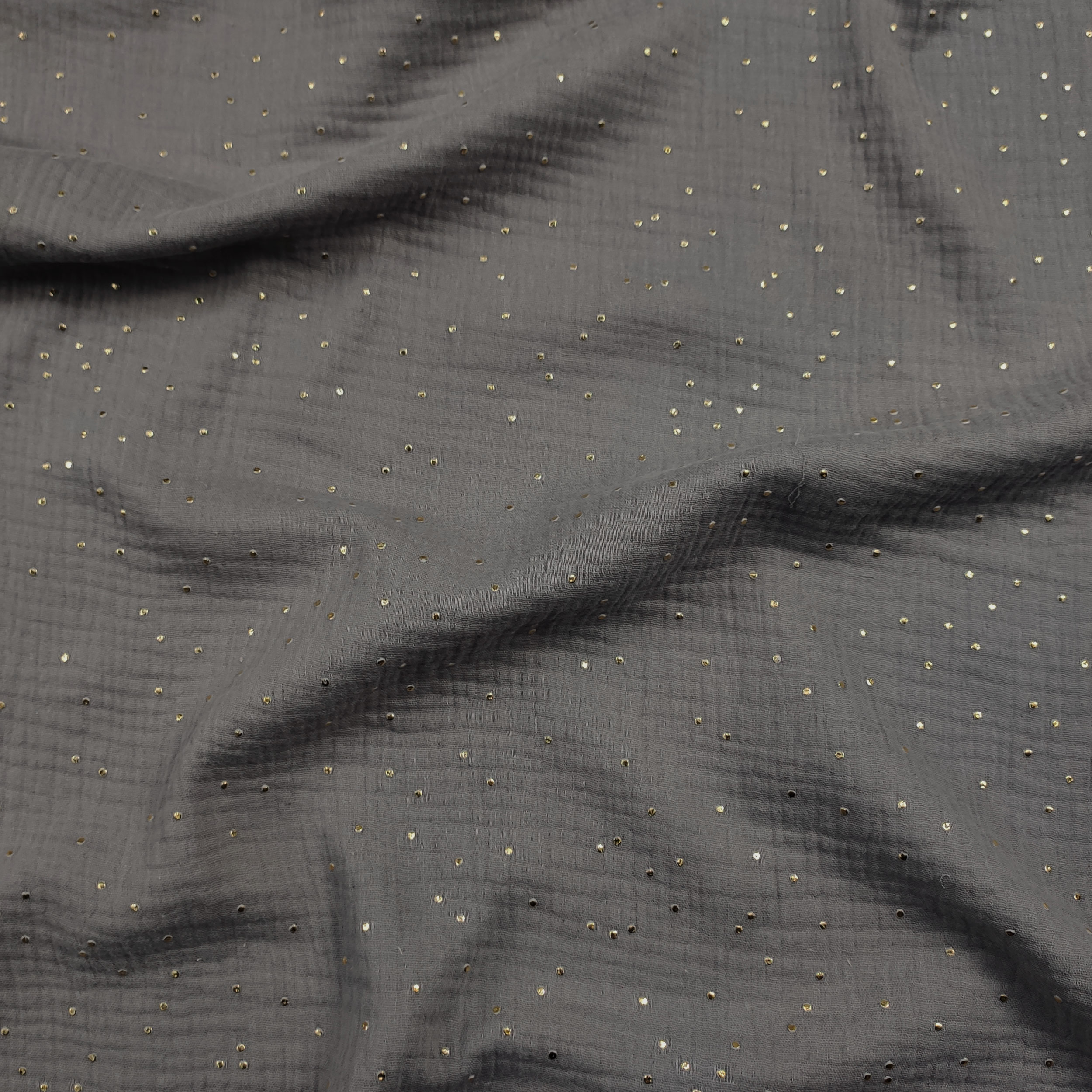 Grauer Baumwollmusselin mit goldenen Polka Dots