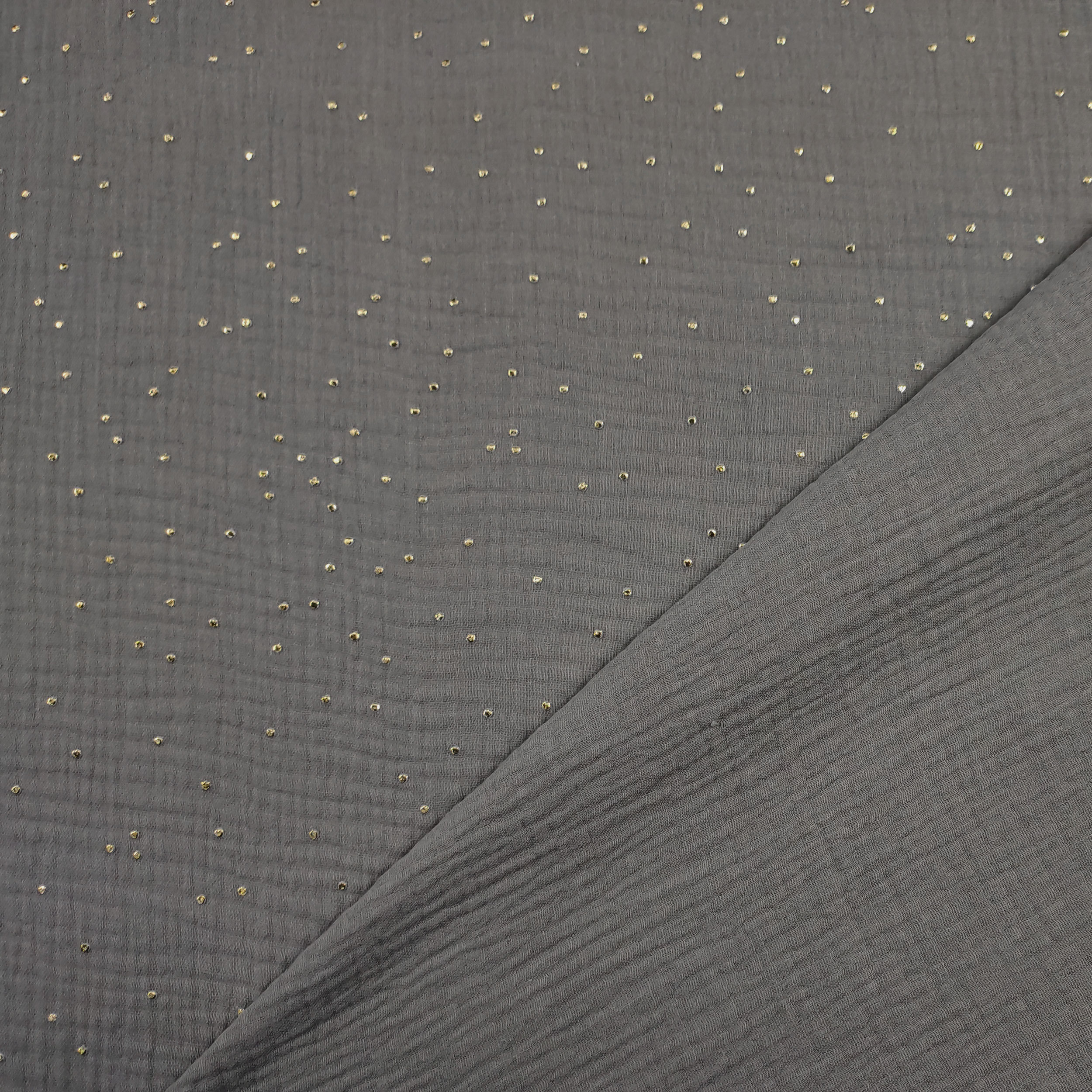 Grauer Baumwollmusselin mit goldenen Polka Dots
