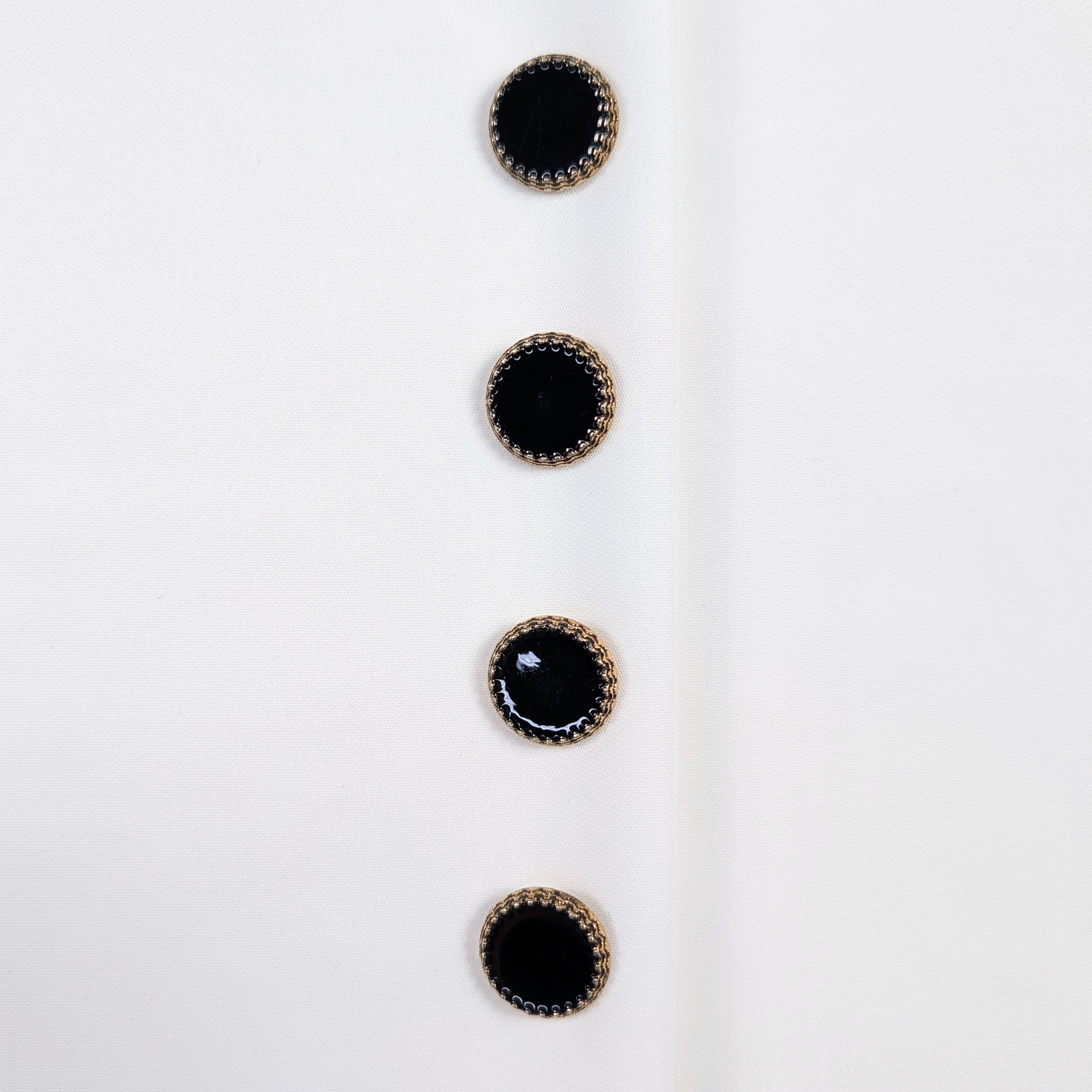 Black Button with Gold Crown Image
