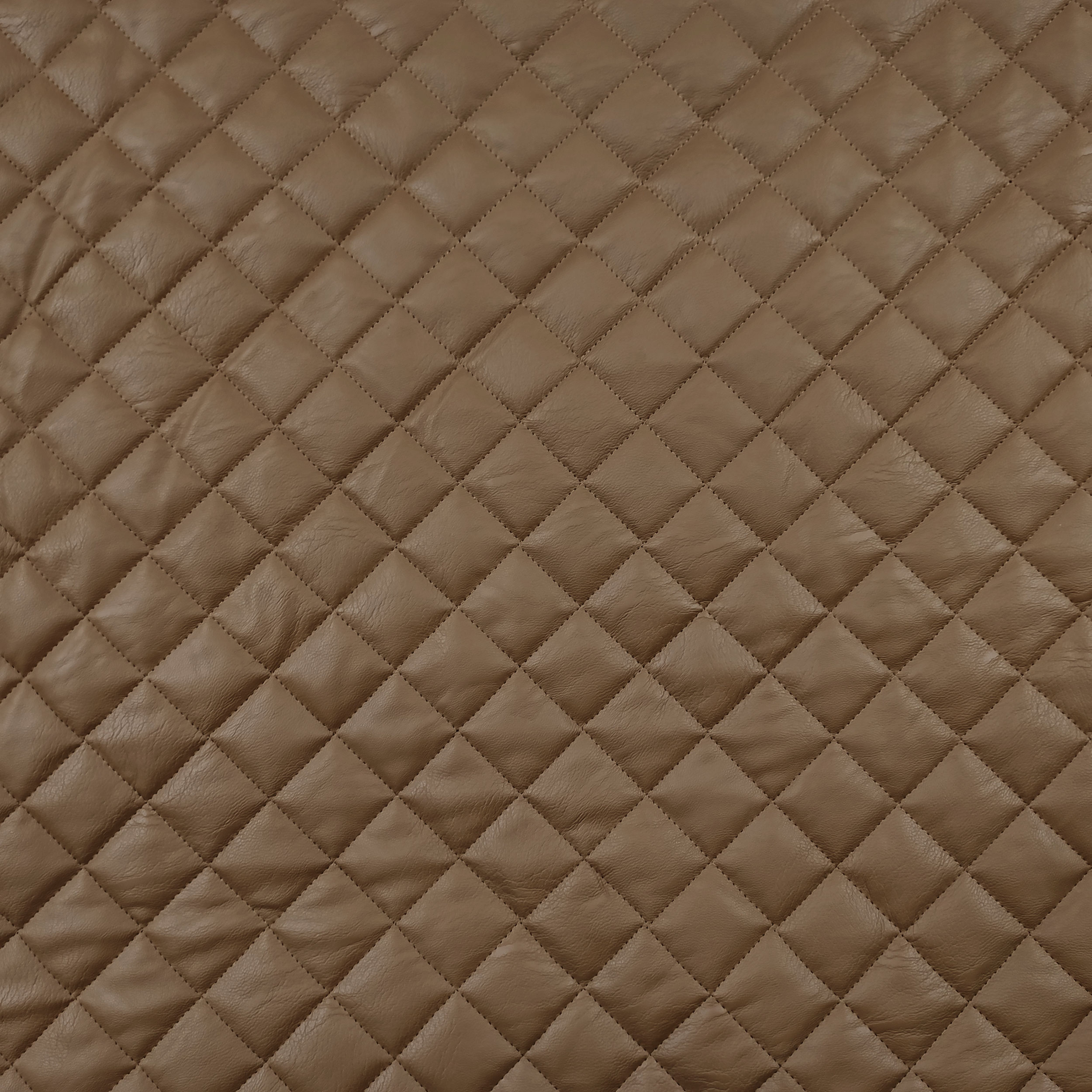 Tissu en faux cuir matelassé brillant Image
