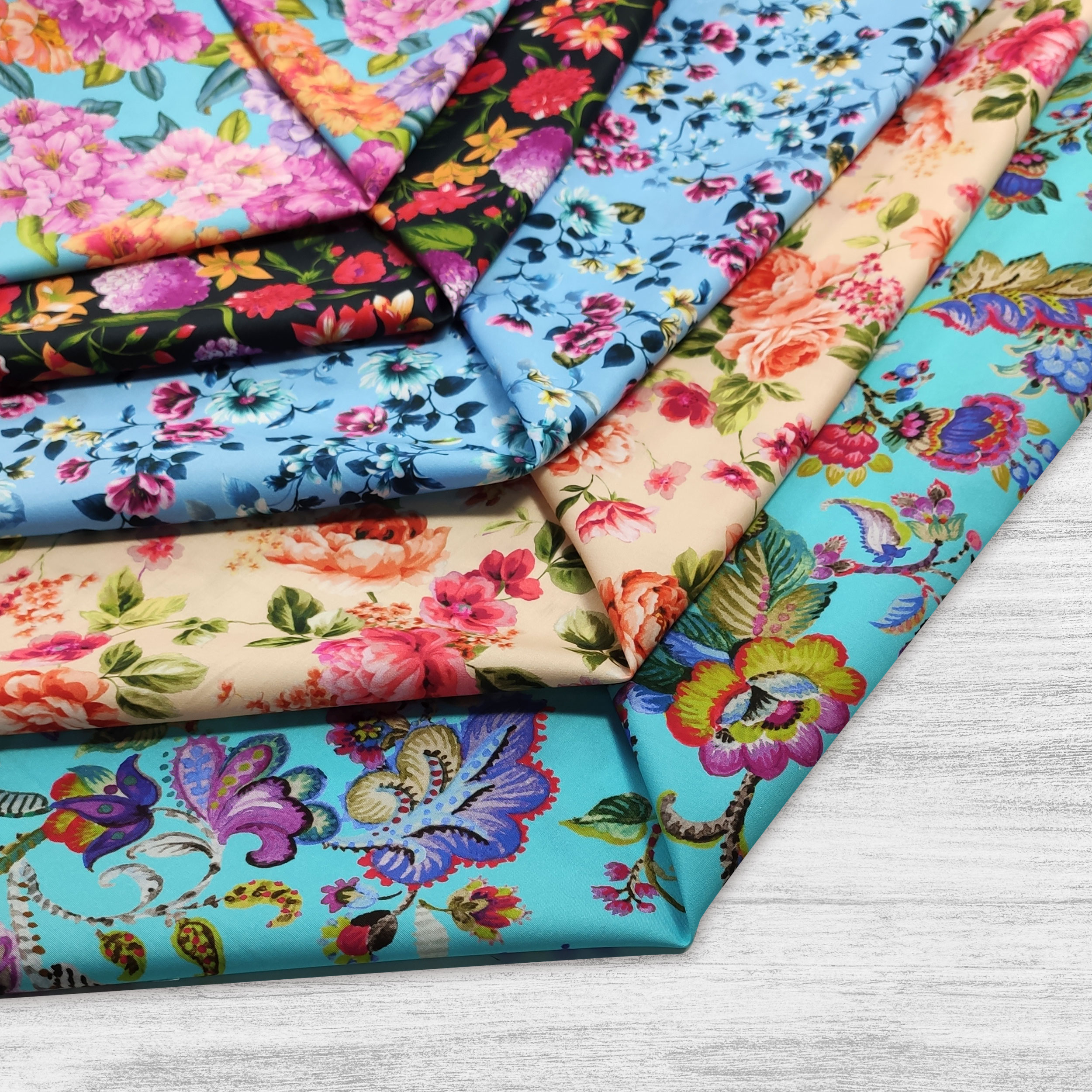 Cotton Rasatello Blue Background with Flowers Image