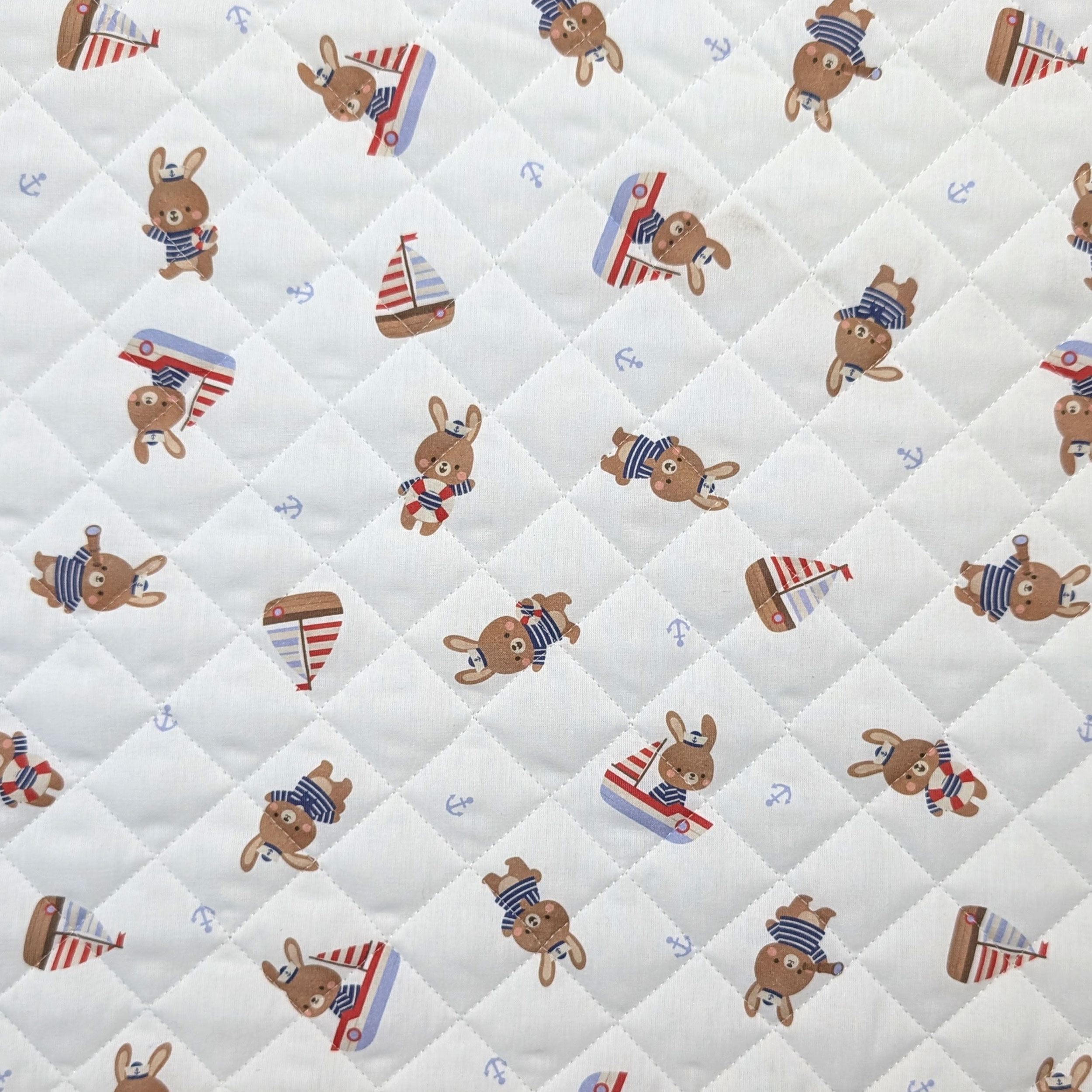 Quilted Fabric Featuring Bunnies in a Boat Image