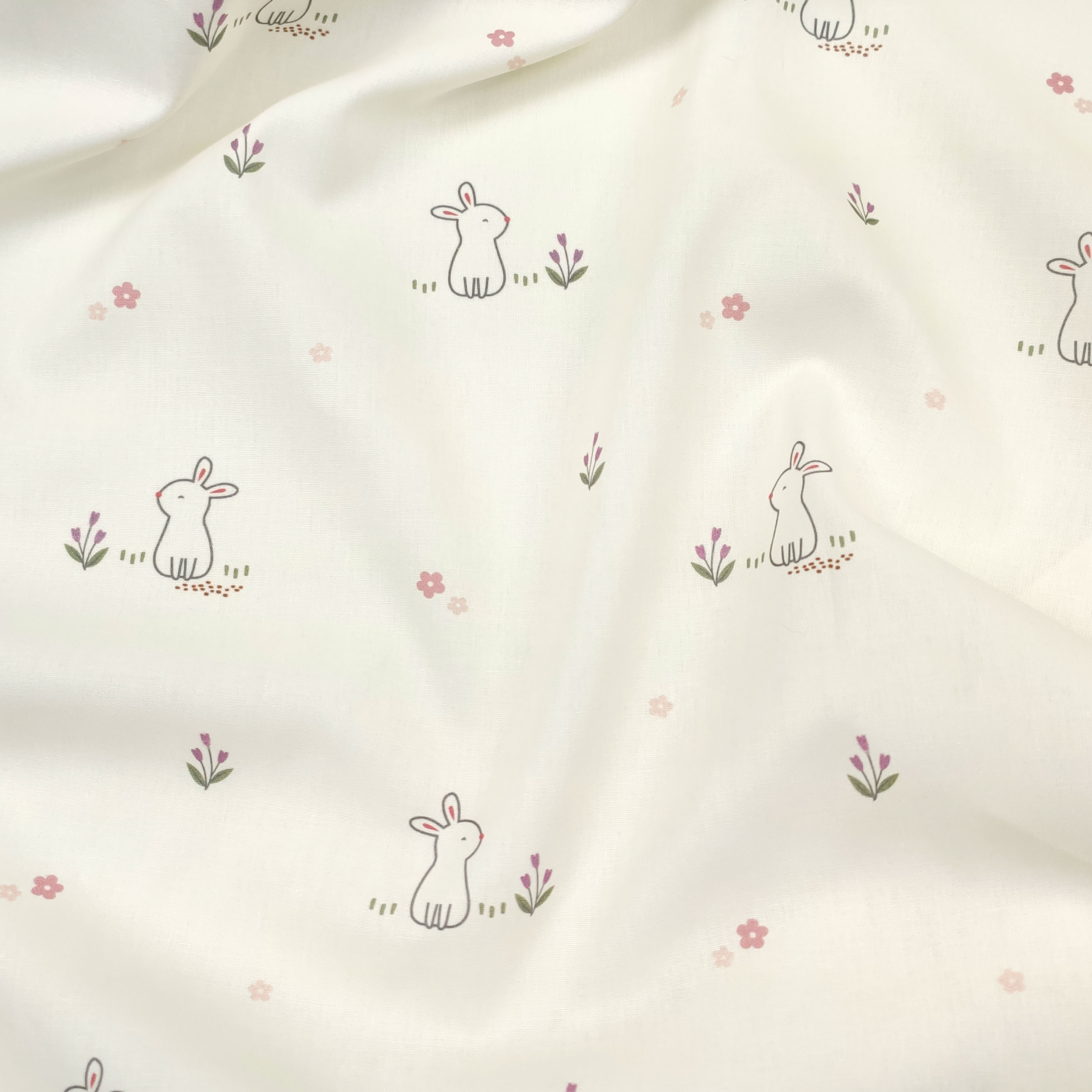 Popeline de coton avec fantaisie de lapin