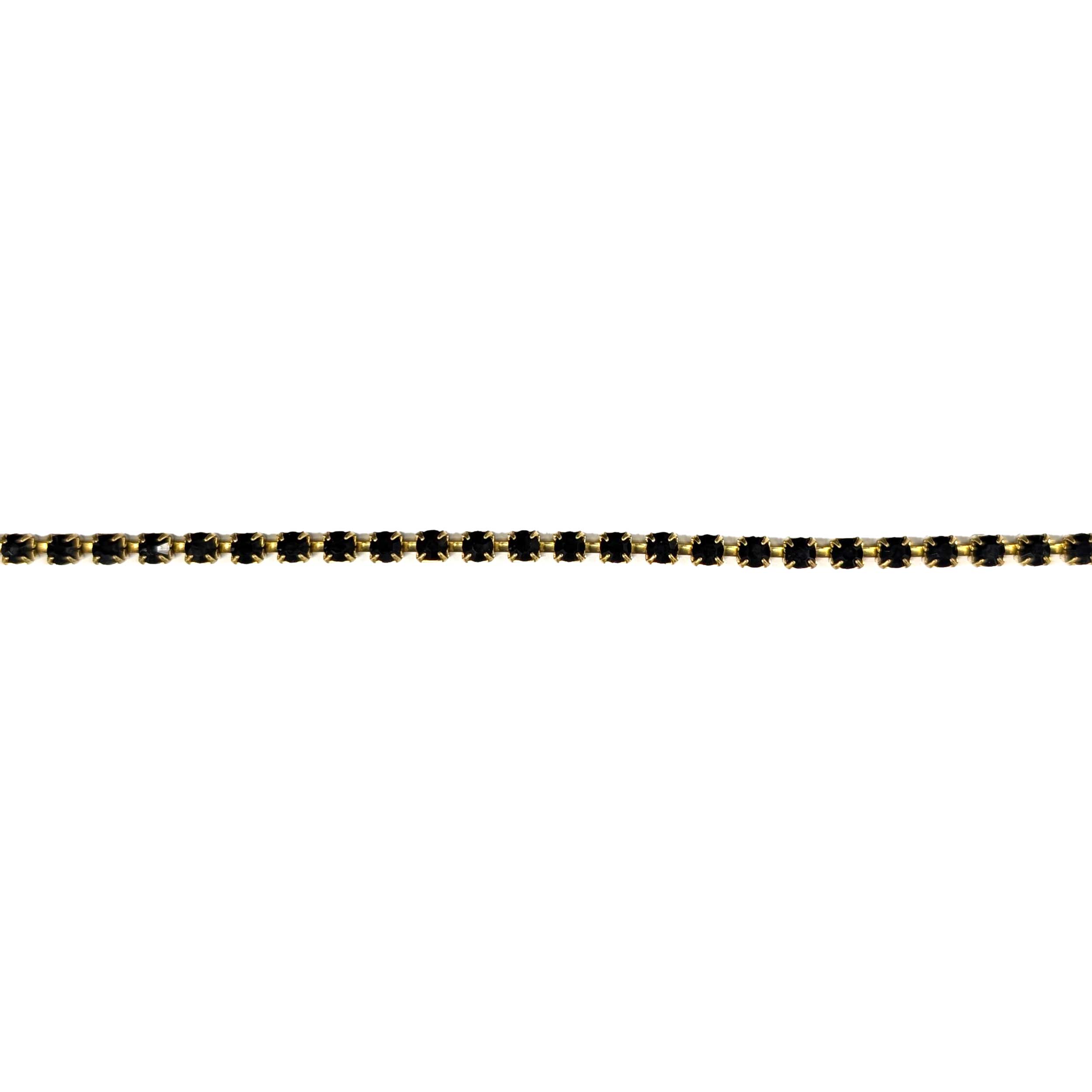 Cadena dorada con brillantes negros Image