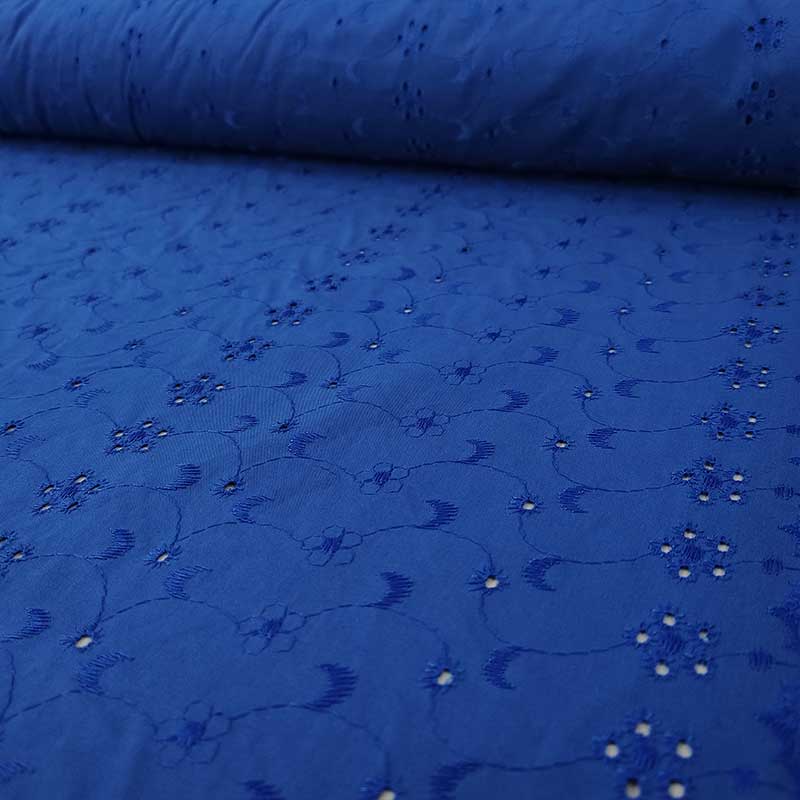 Tessuto Sangallo Tinta Unita Fantasia Sole Luna Fiori 