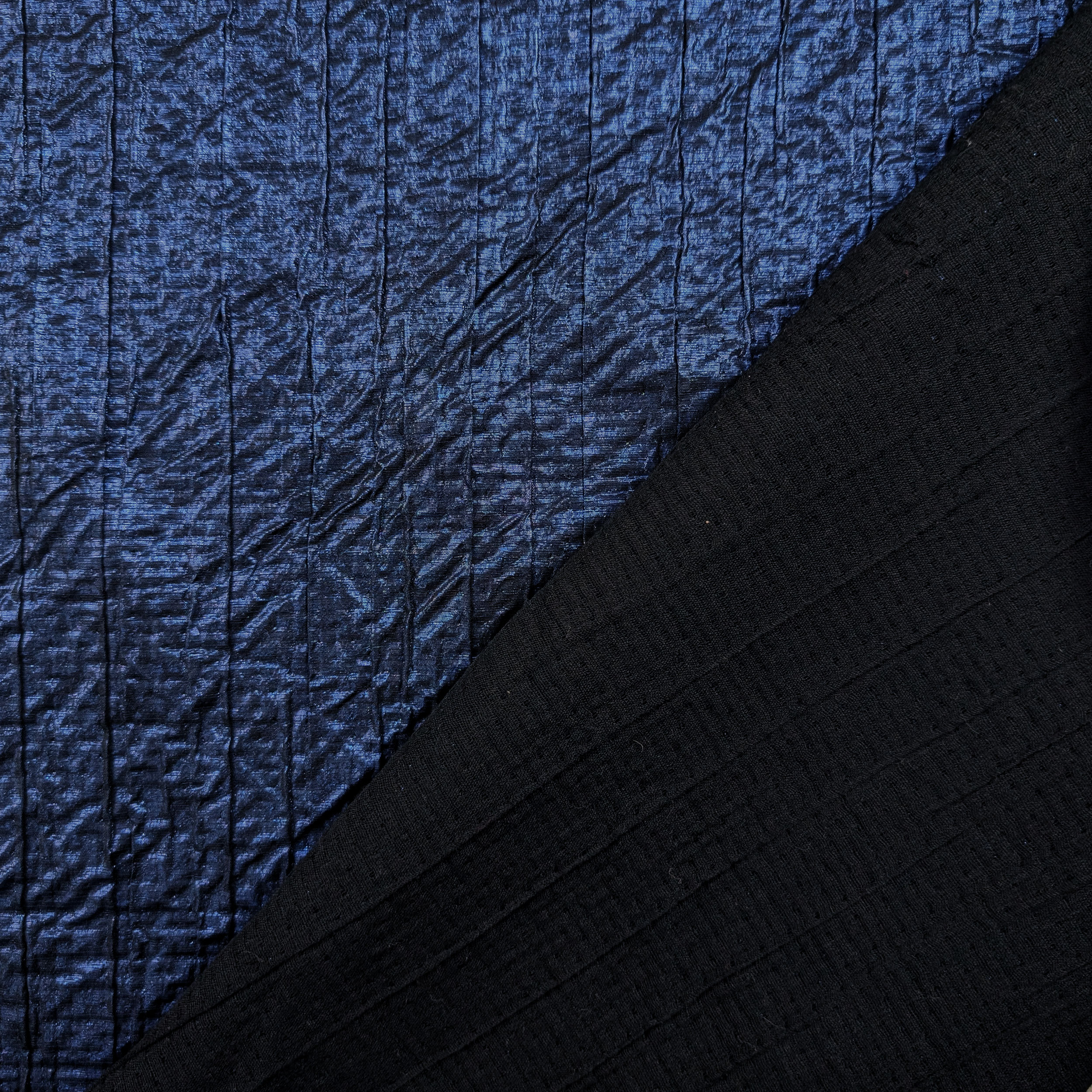 Embossed Laminated Fabric Blue Image