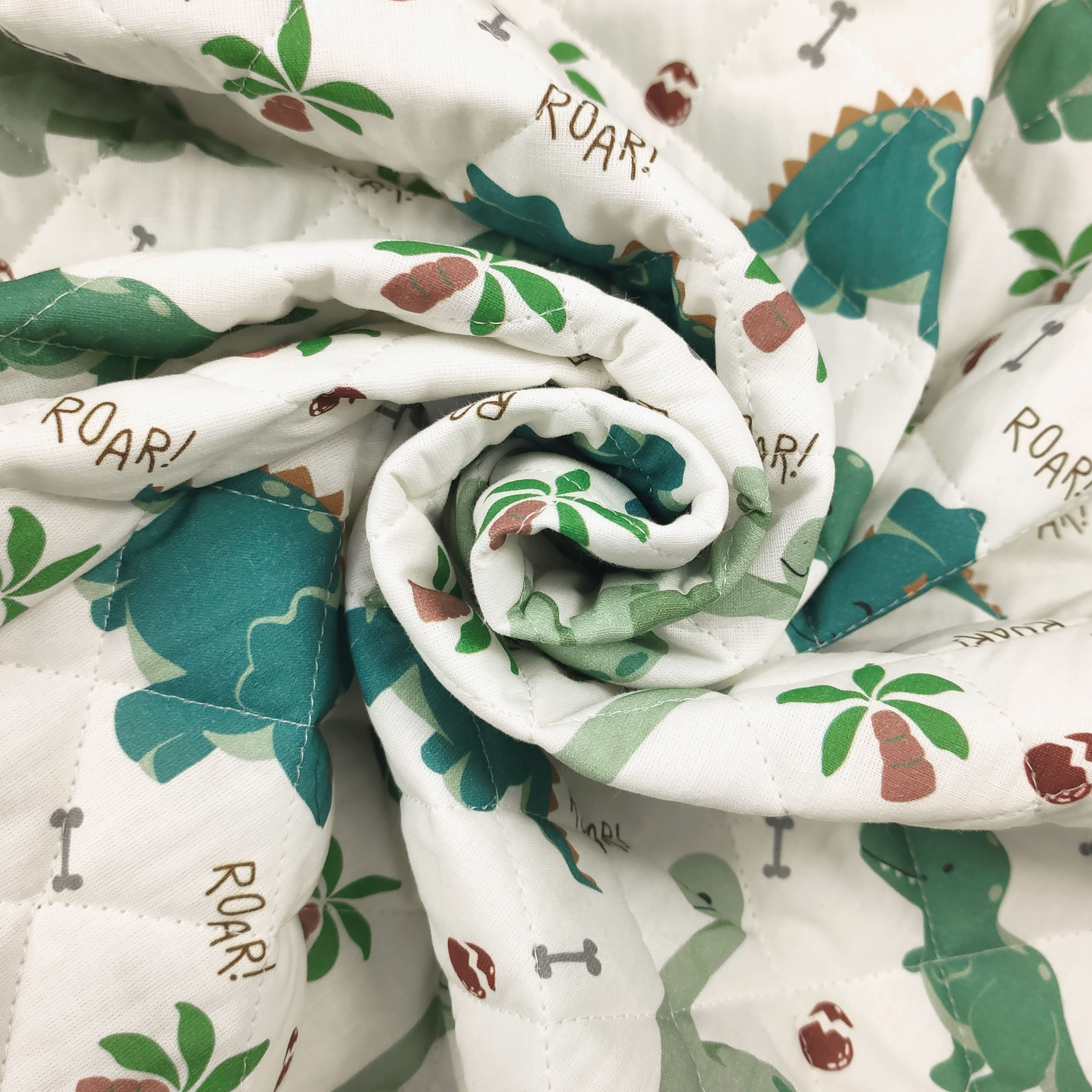 Dinosaurs Quilted Fabric Image