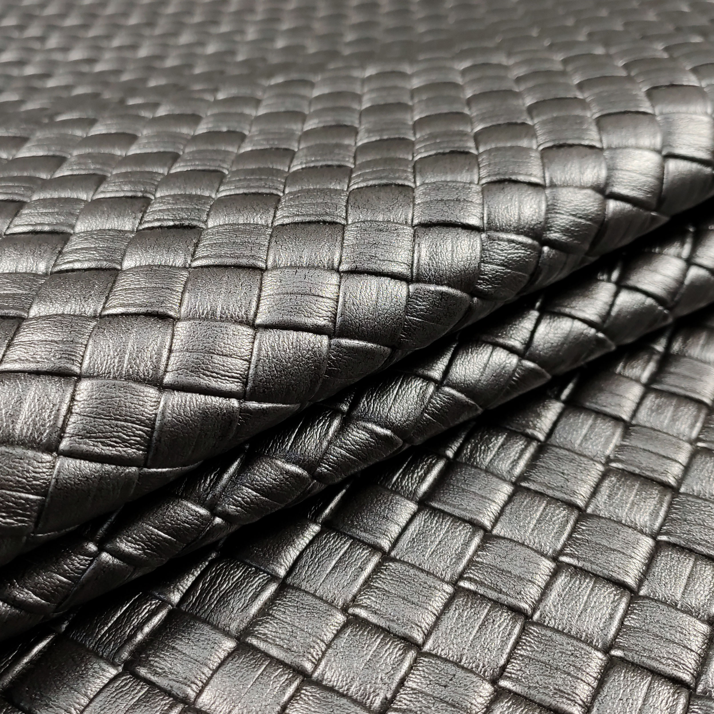 Faux cuir matelassé avec tresse Image