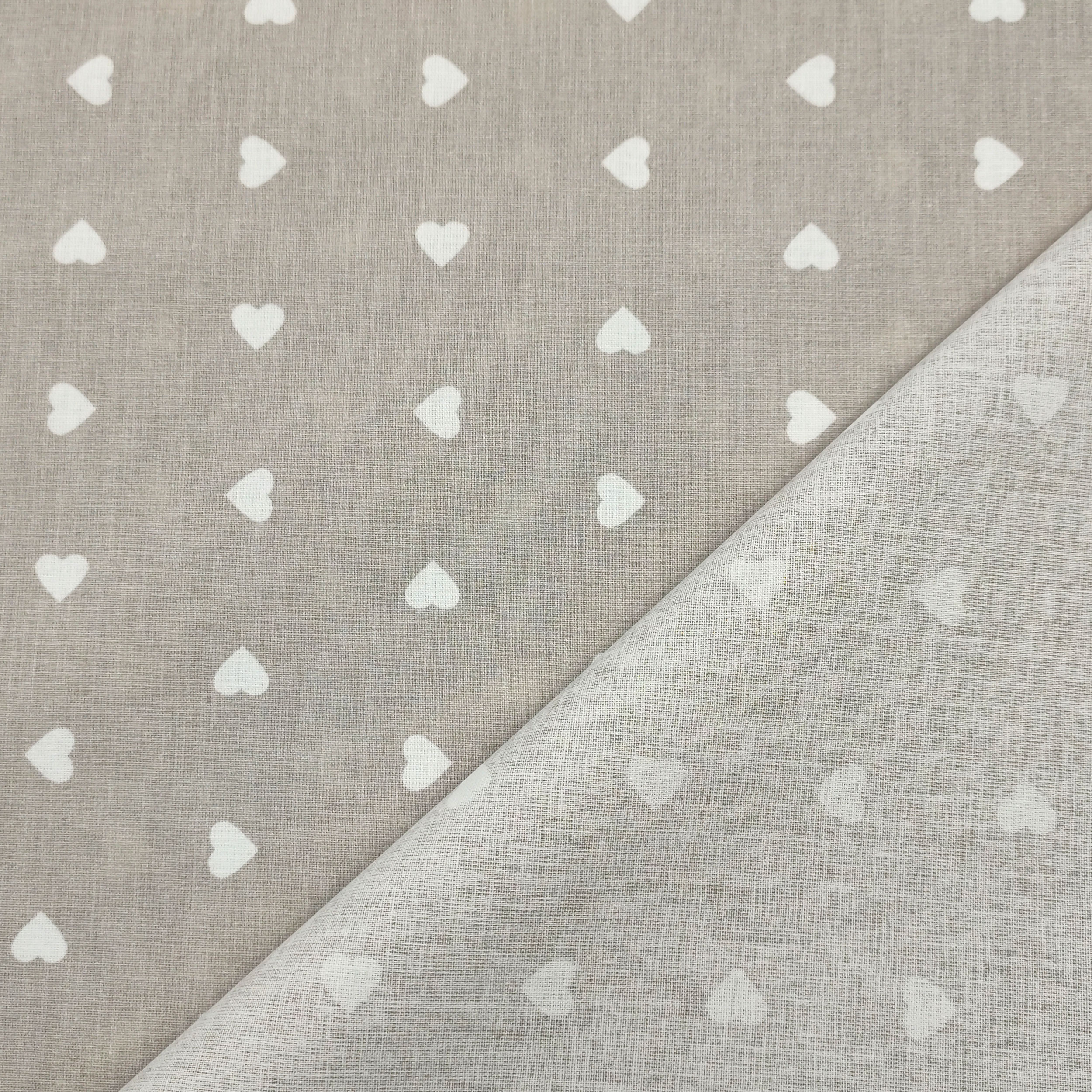 Printed Cotton with White Hearts - Colored Background  Image