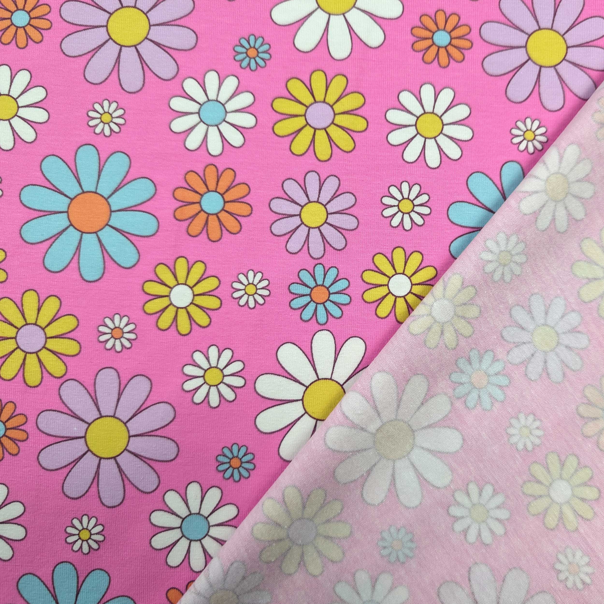 Pink-background cotton jersey with daisies Image