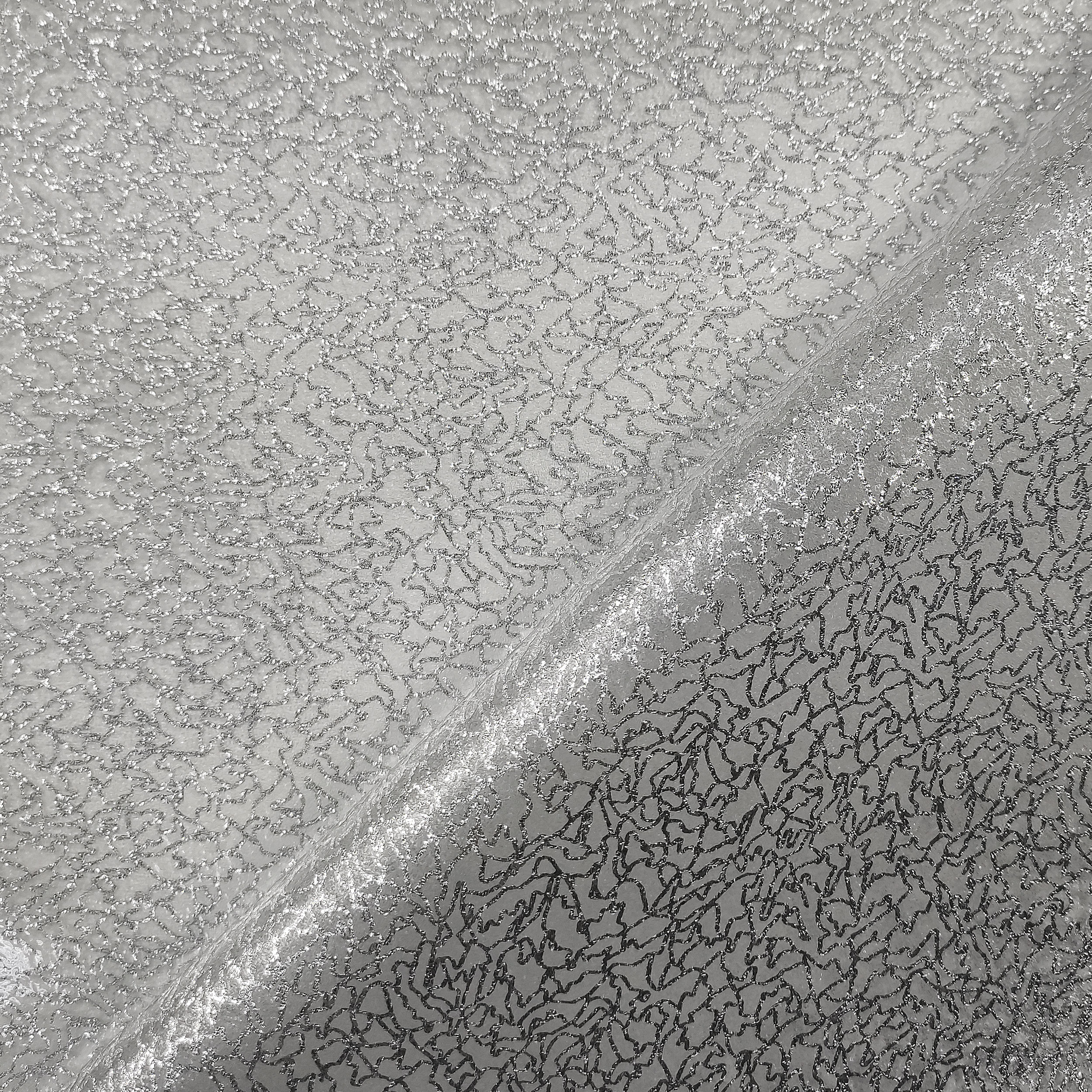 Nappes plastifiées à motifs pailletés argentés