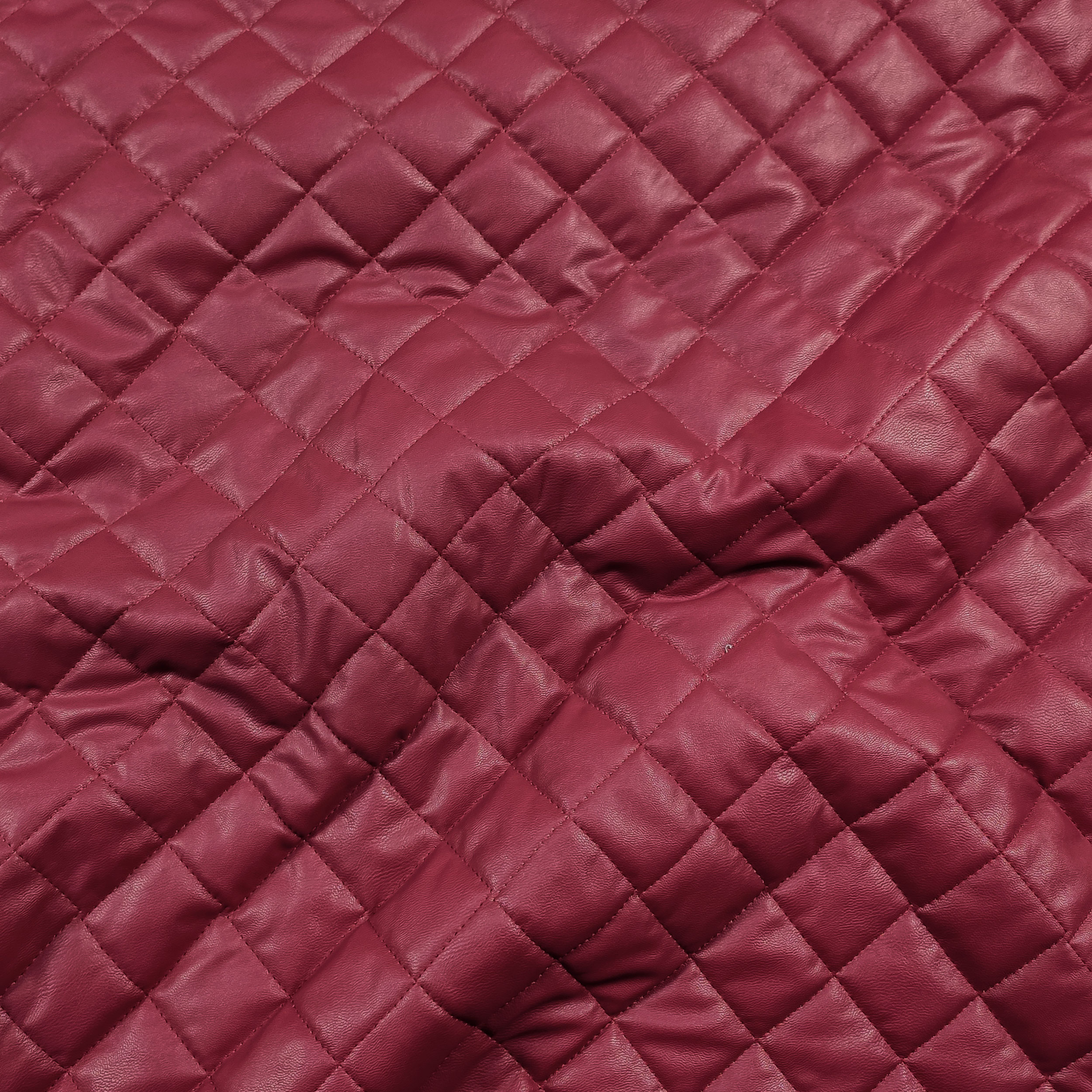 Tissu en faux cuir matelassé brillant Image