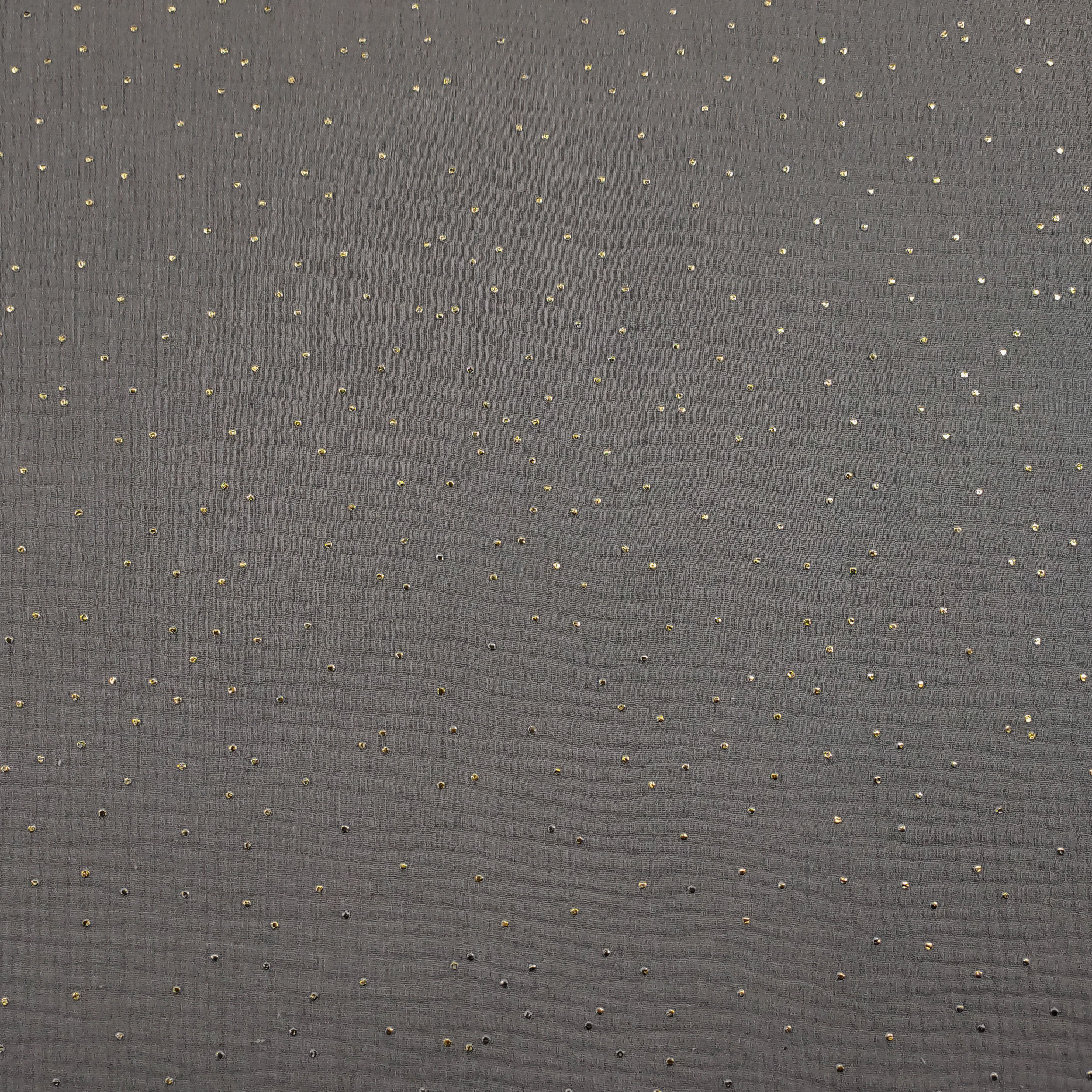 Grauer Baumwollmusselin mit goldenen Polka Dots