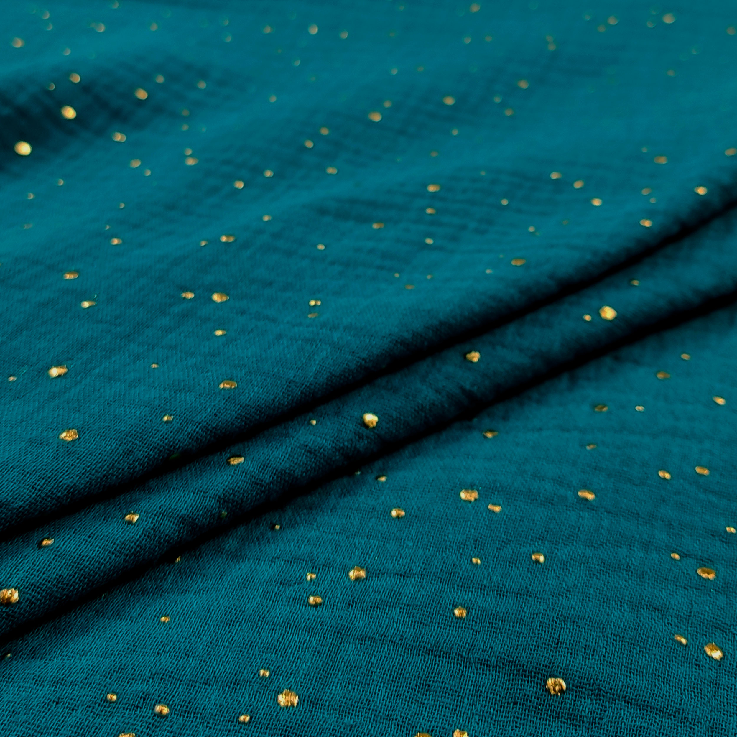 Petroleum Baumwollmusselin mit goldenen Polka Dots
