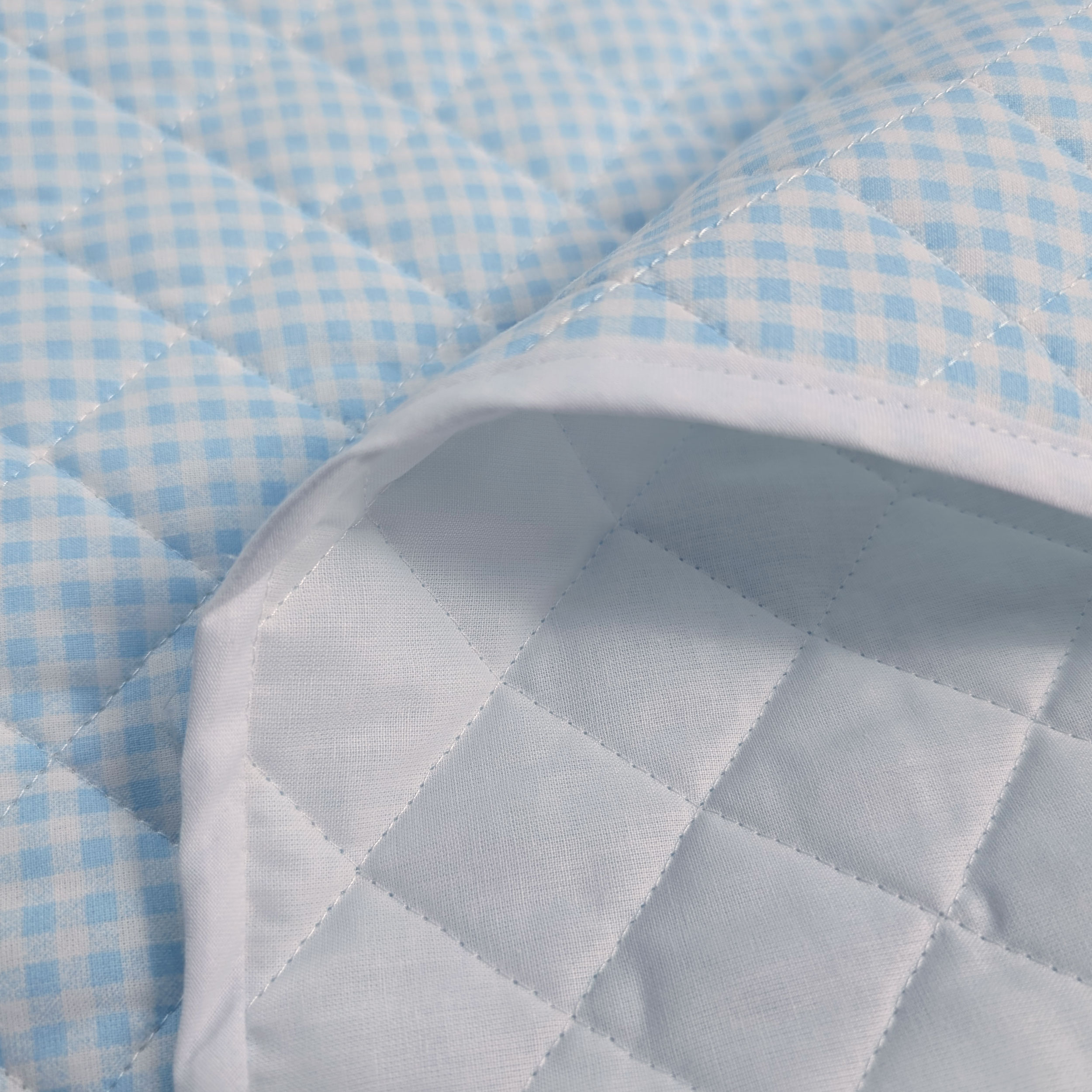 Blue Checkered Blanket Image