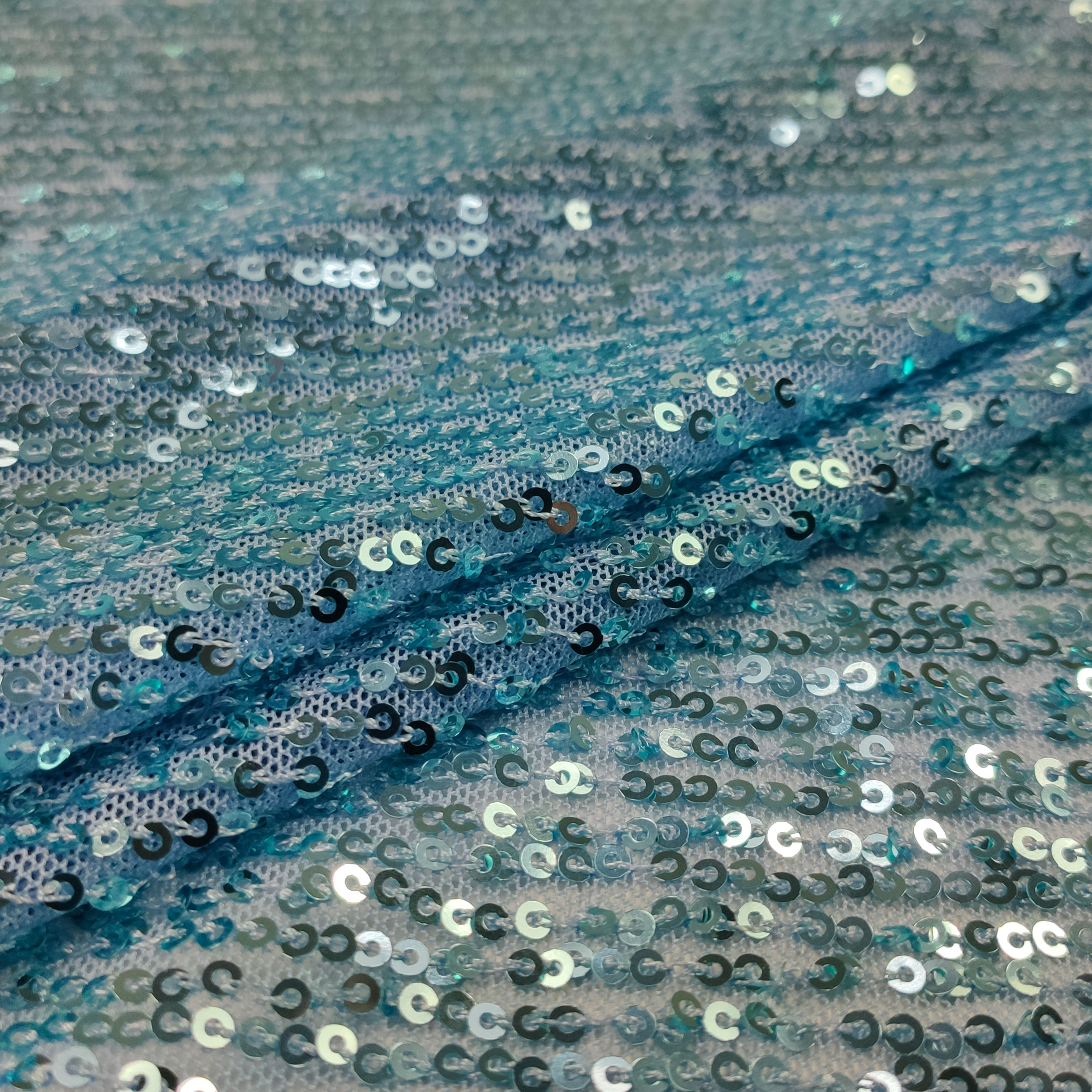 Tissu à paillettes bleu
