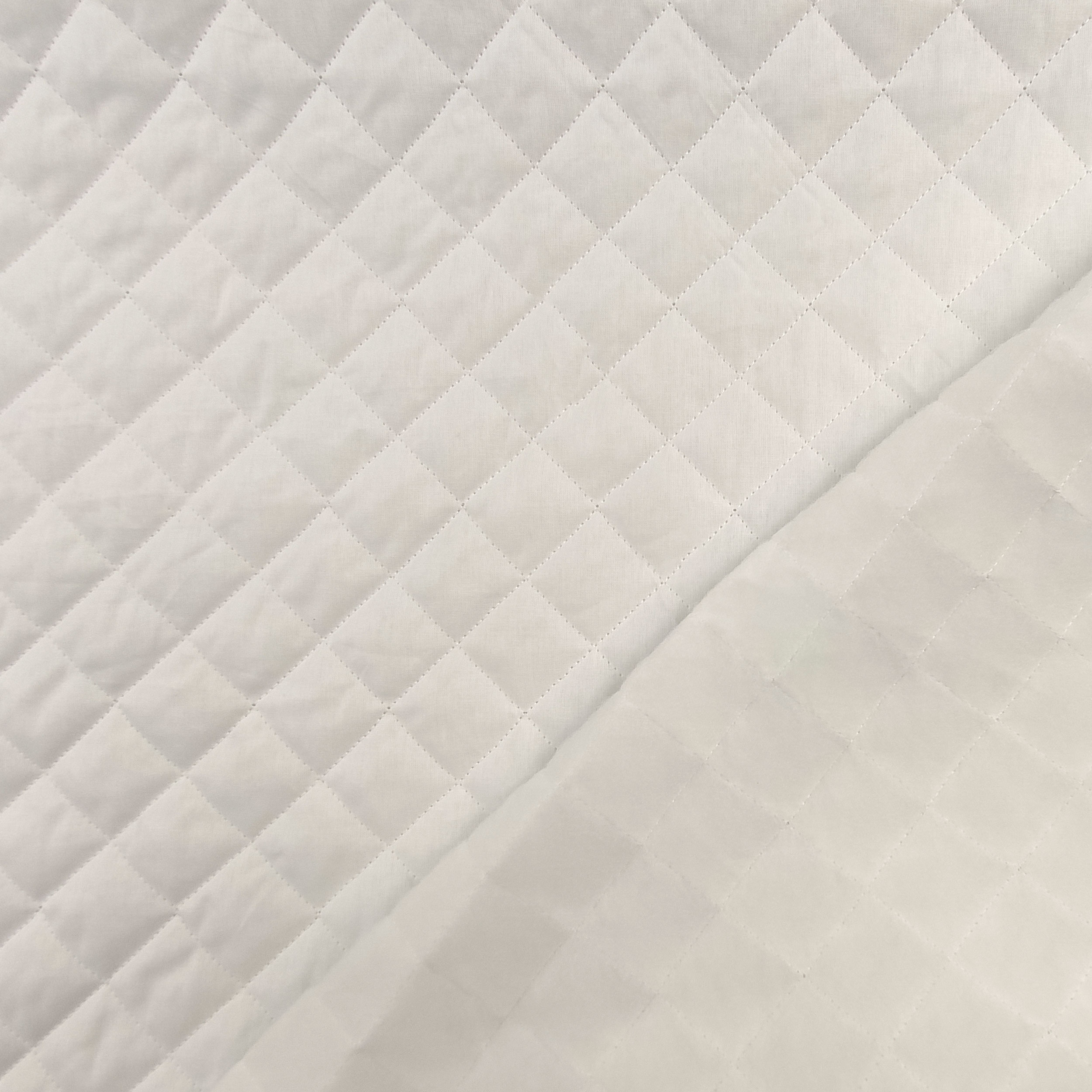 Tejido acolchado blanco