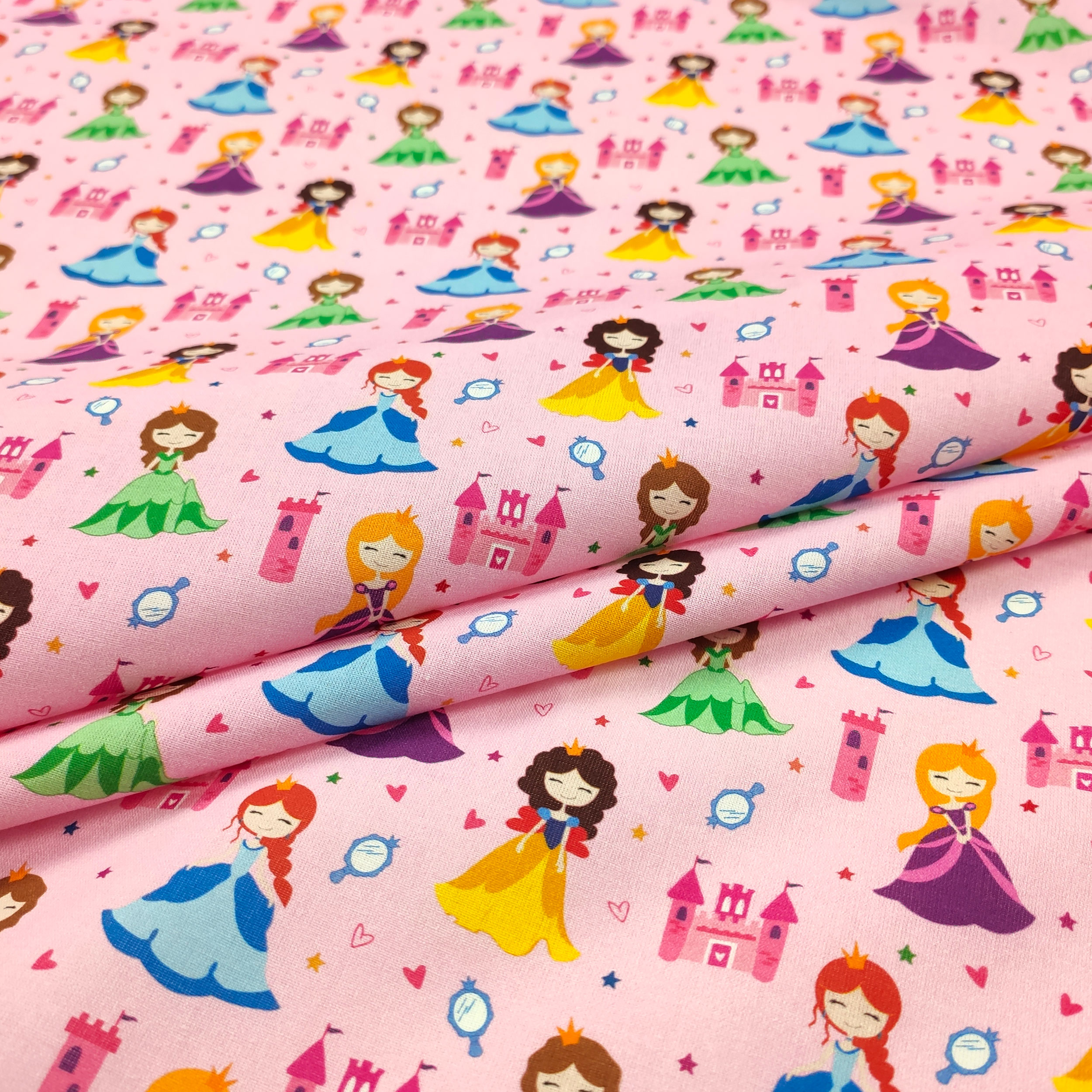 Tissu de coton Petites princesses fond rose