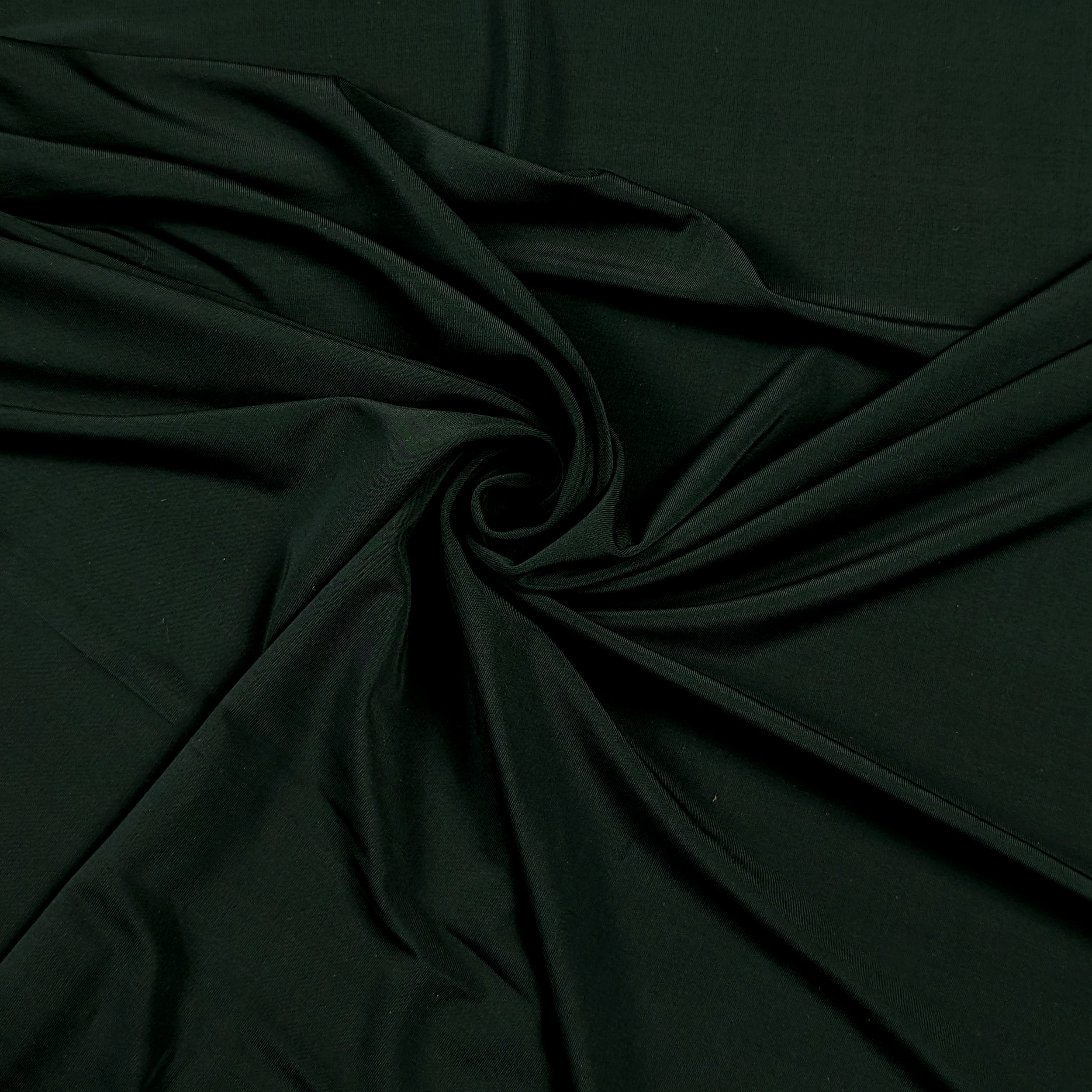 Bi-elastic plain green fabric Image