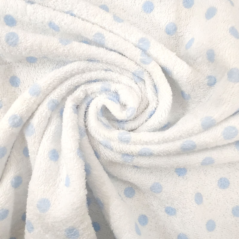 Tela esponja estampada de lunares azul claro