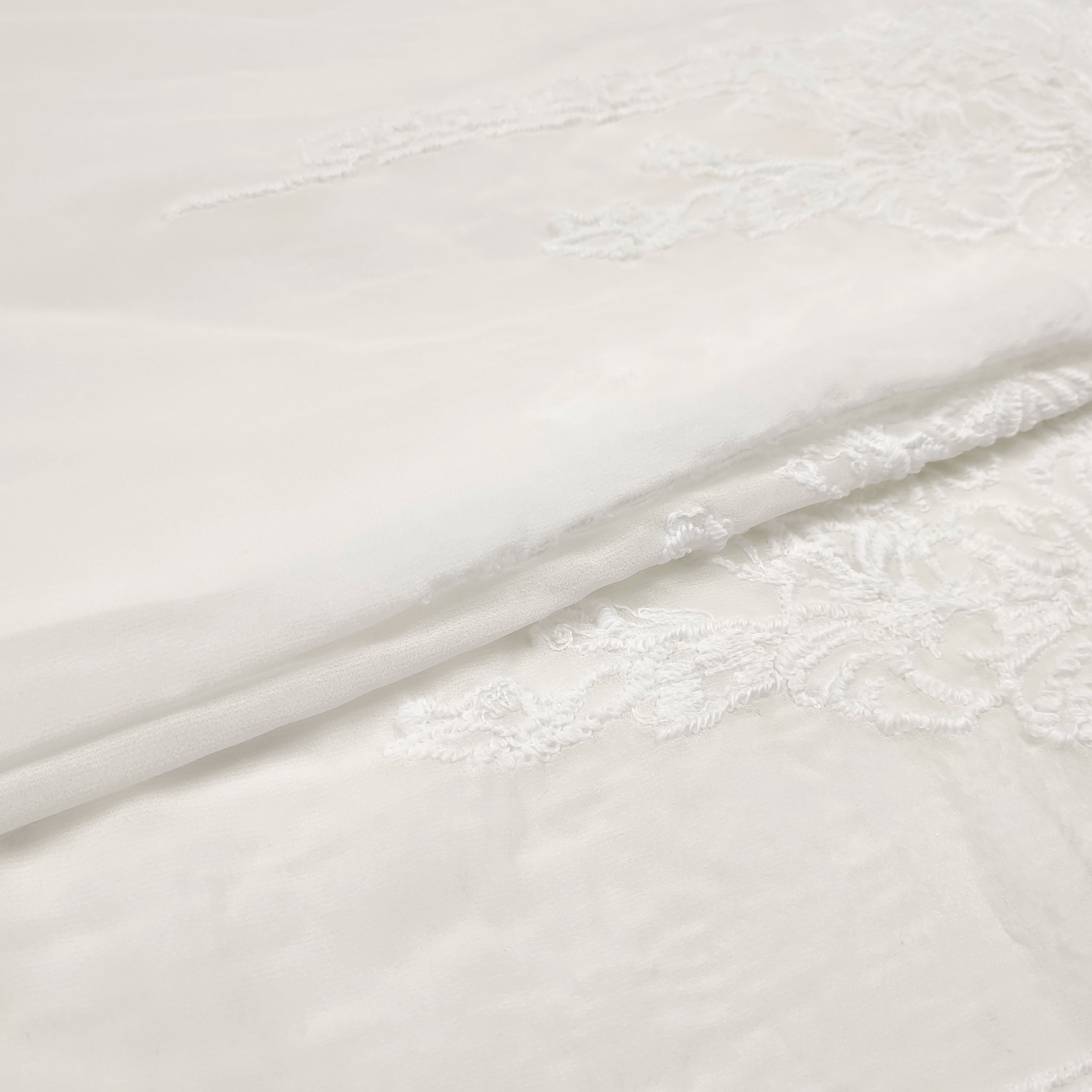 Tissu de mousseline brodée Double feston blanc