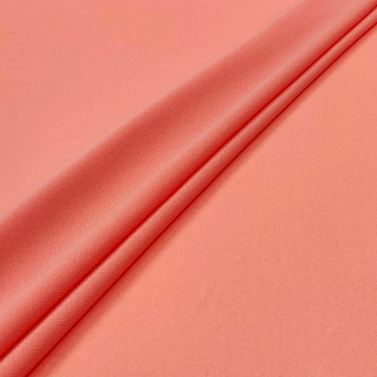 tessuto-georgette-elasticizzato-pesca 1