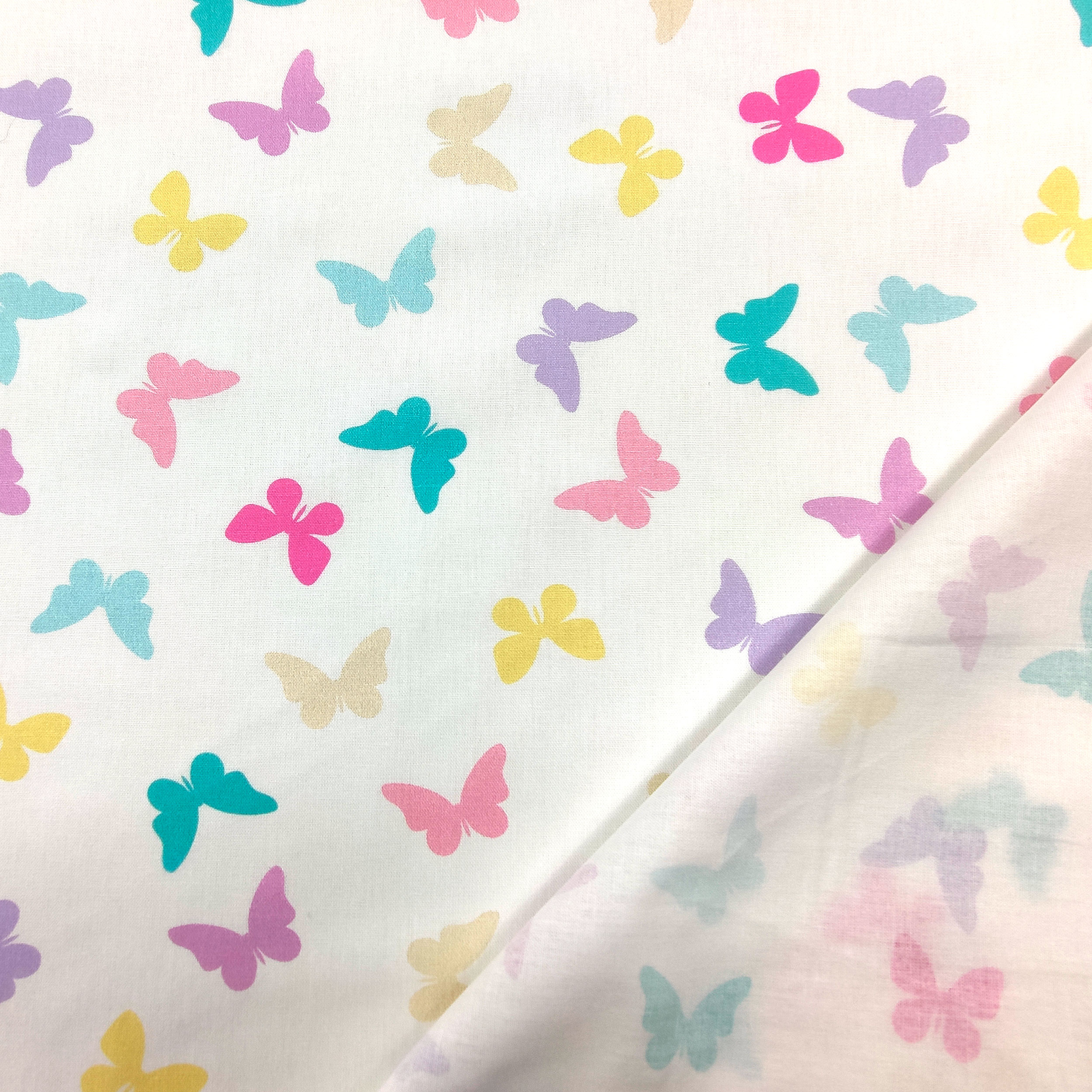 Popeline de coton à motifs de papillons colorés Image