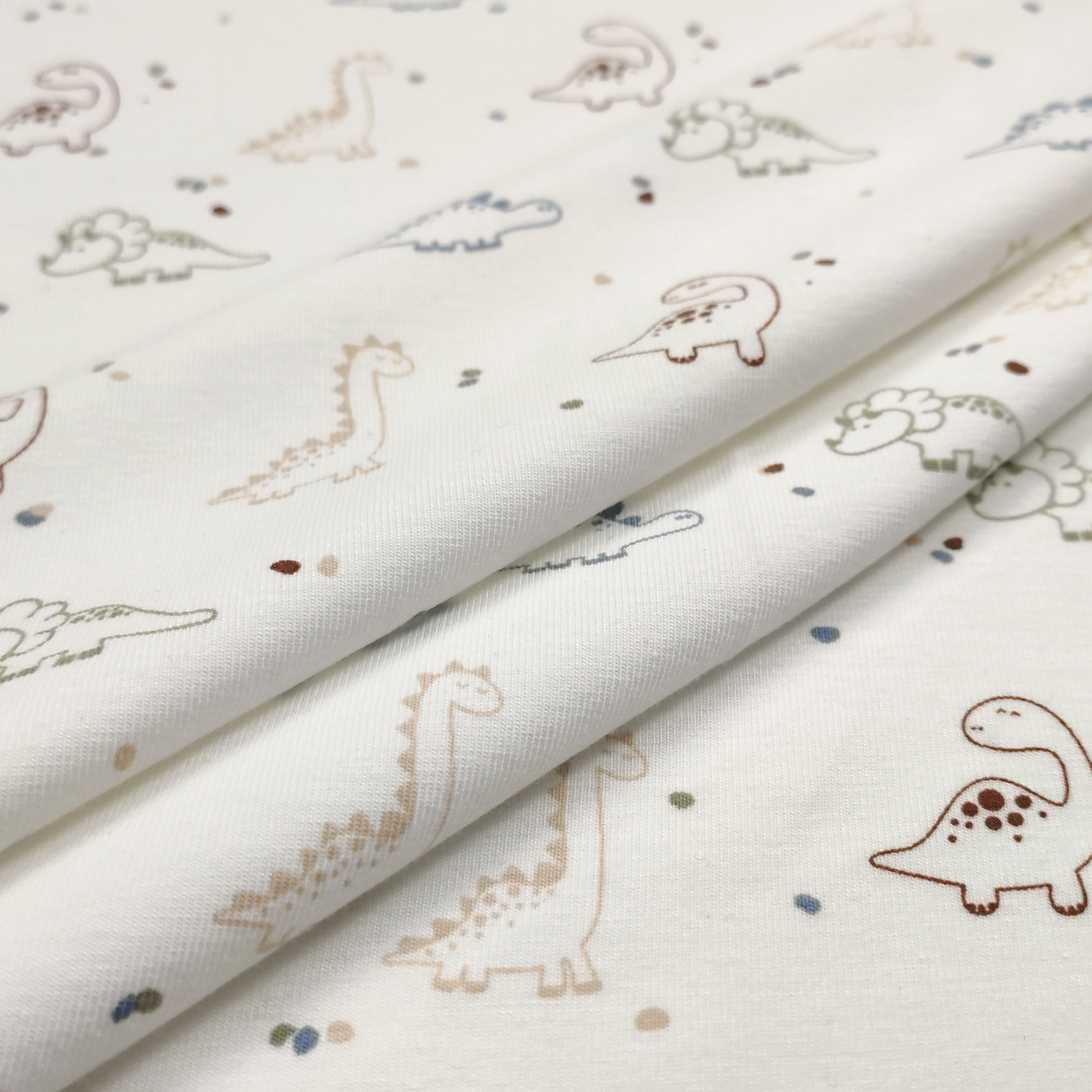Dressmaking Cotton Jersey - Dinosaurs Image