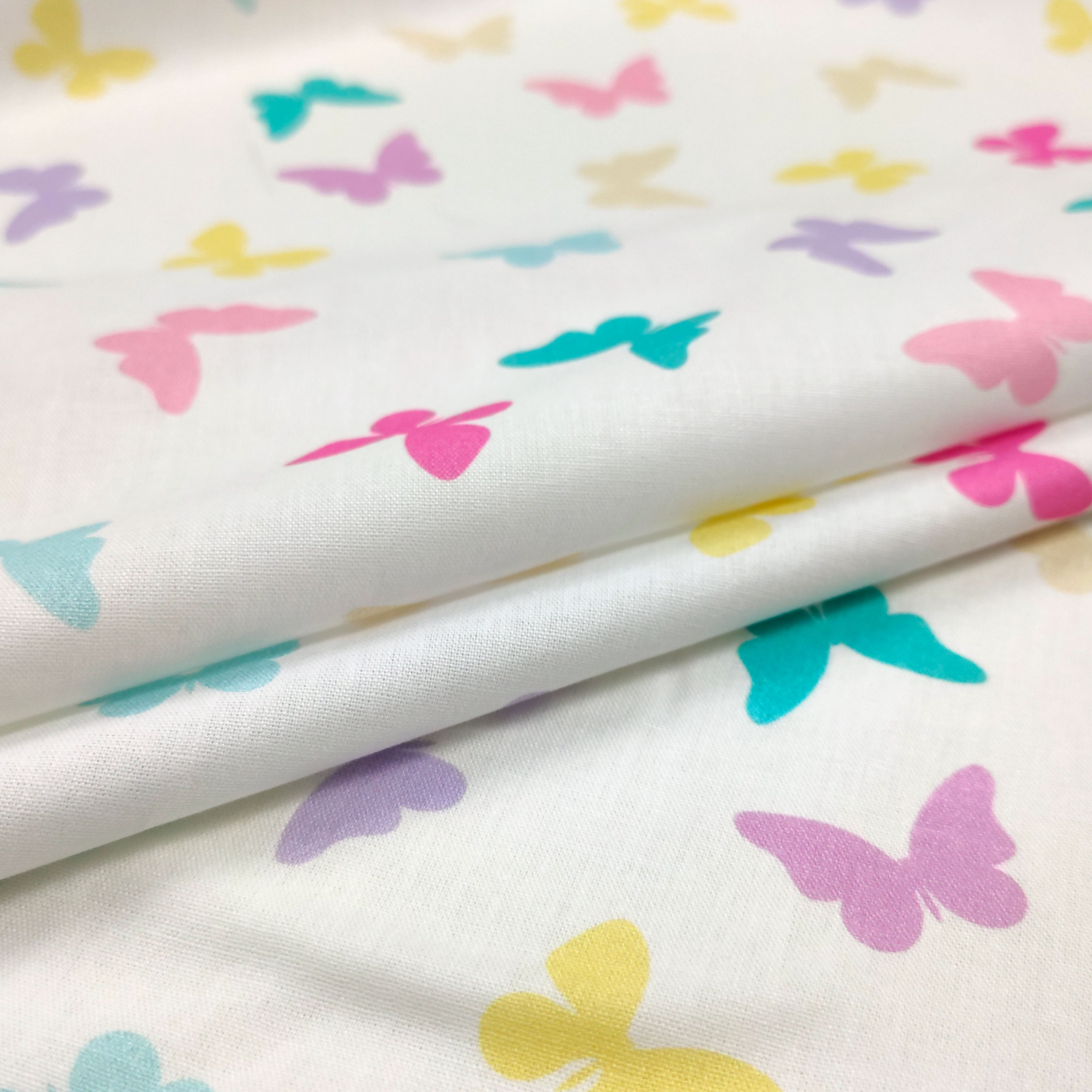 Popeline de coton à motifs de papillons colorés Image