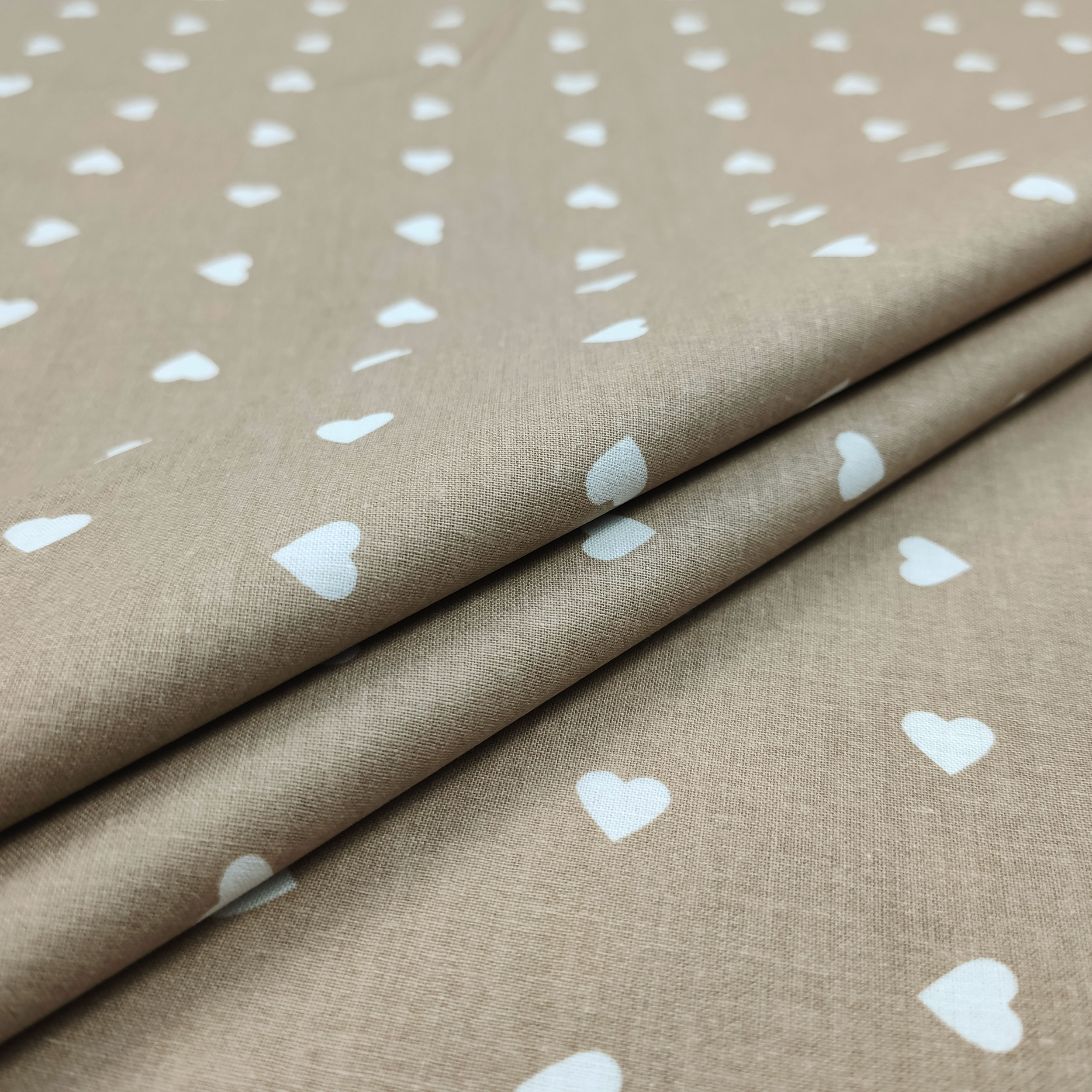 Printed Cotton with White Hearts - Colored Background  Image
