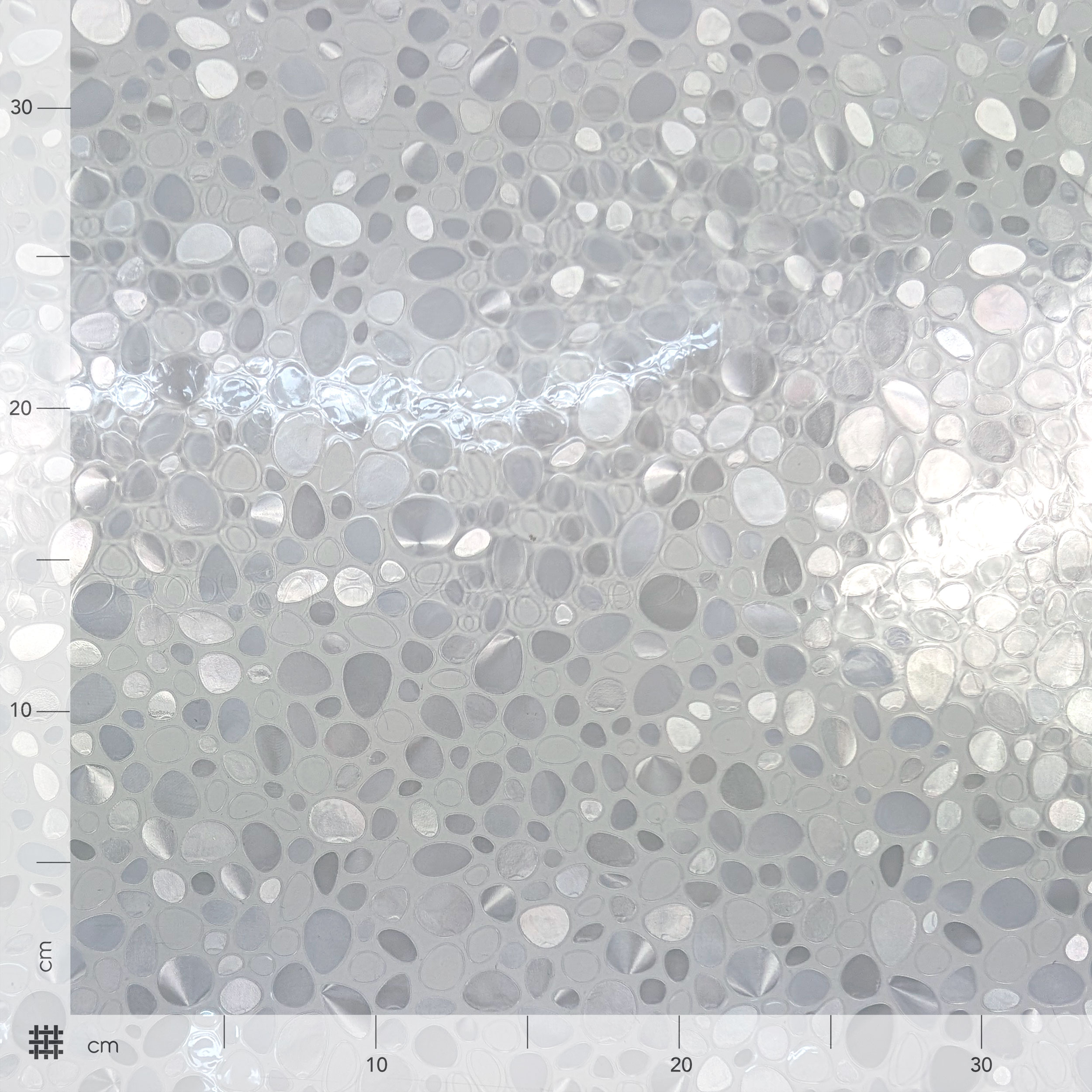 Plastic-coated table cover with pebbles Image